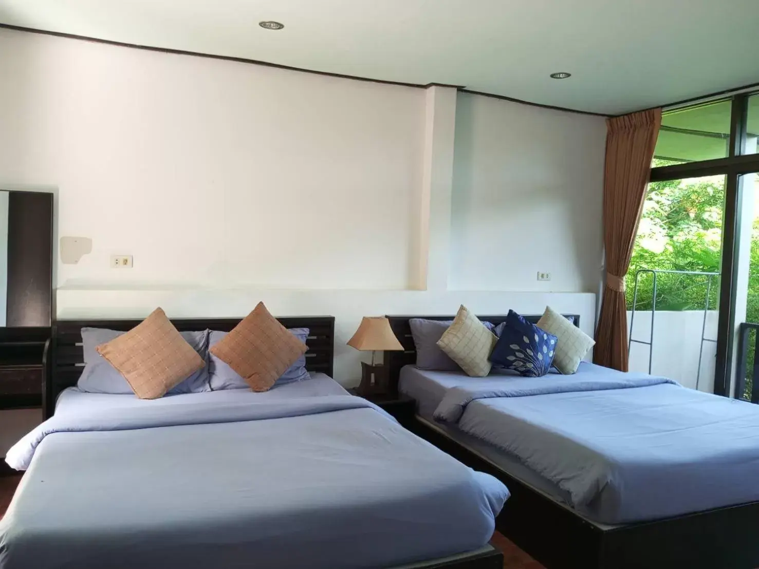 Photo of the whole room, Bed in Faye Orchid Garden Resort