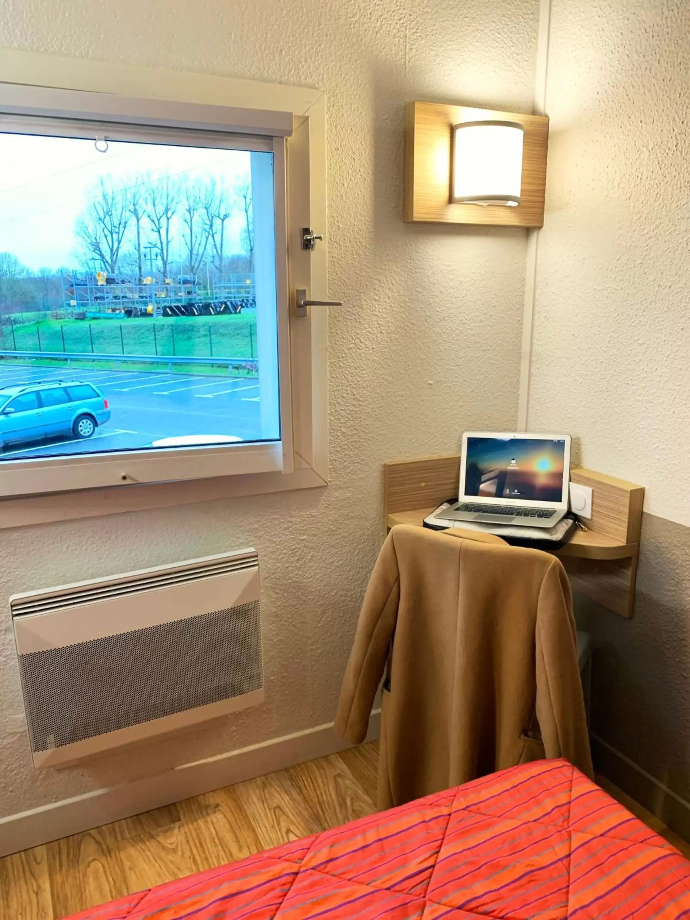 View (from property/room), TV/Entertainment Center in Premiere Classe Arras - Tilloy Les Mofflaine