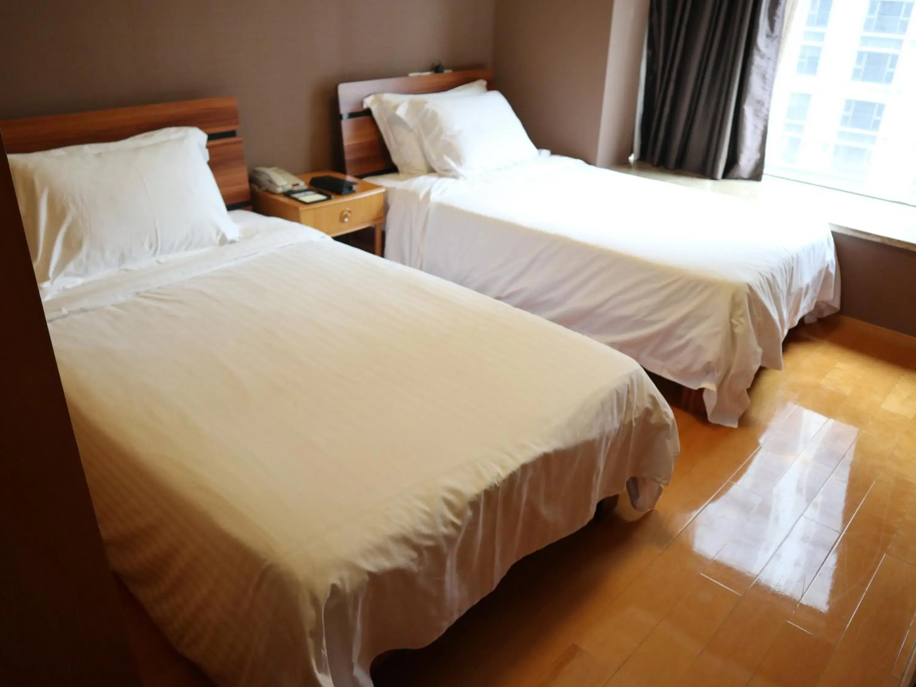 Bed in Dan Executive Hotel Apartment Zhujiang New Town