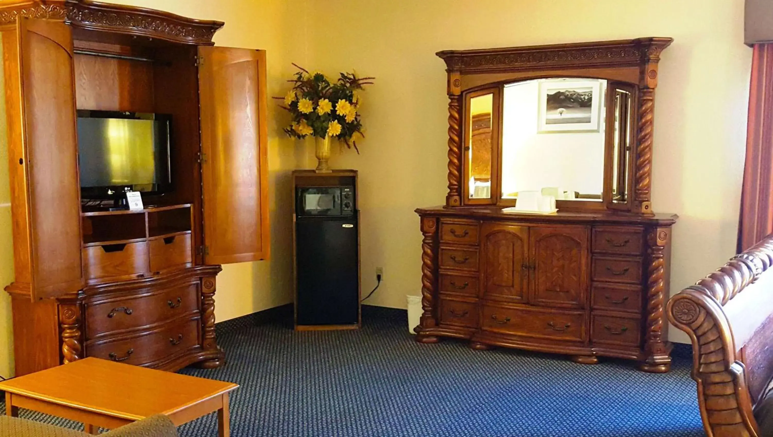 Photo of the whole room, TV/Entertainment Center in Magnuson Hotel Sand Springs-Tulsa West