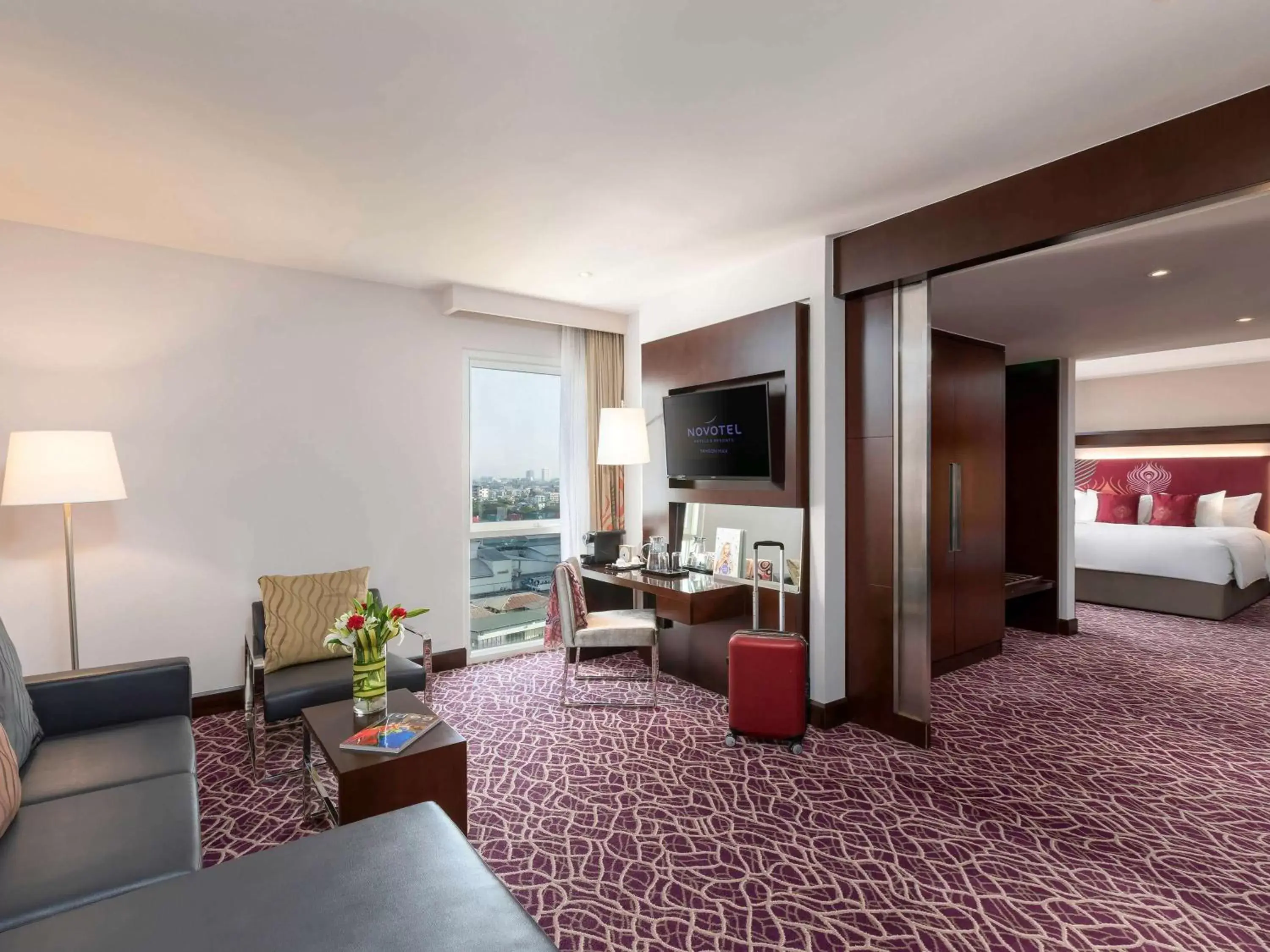 Photo of the whole room, Seating Area in Novotel Yangon Max