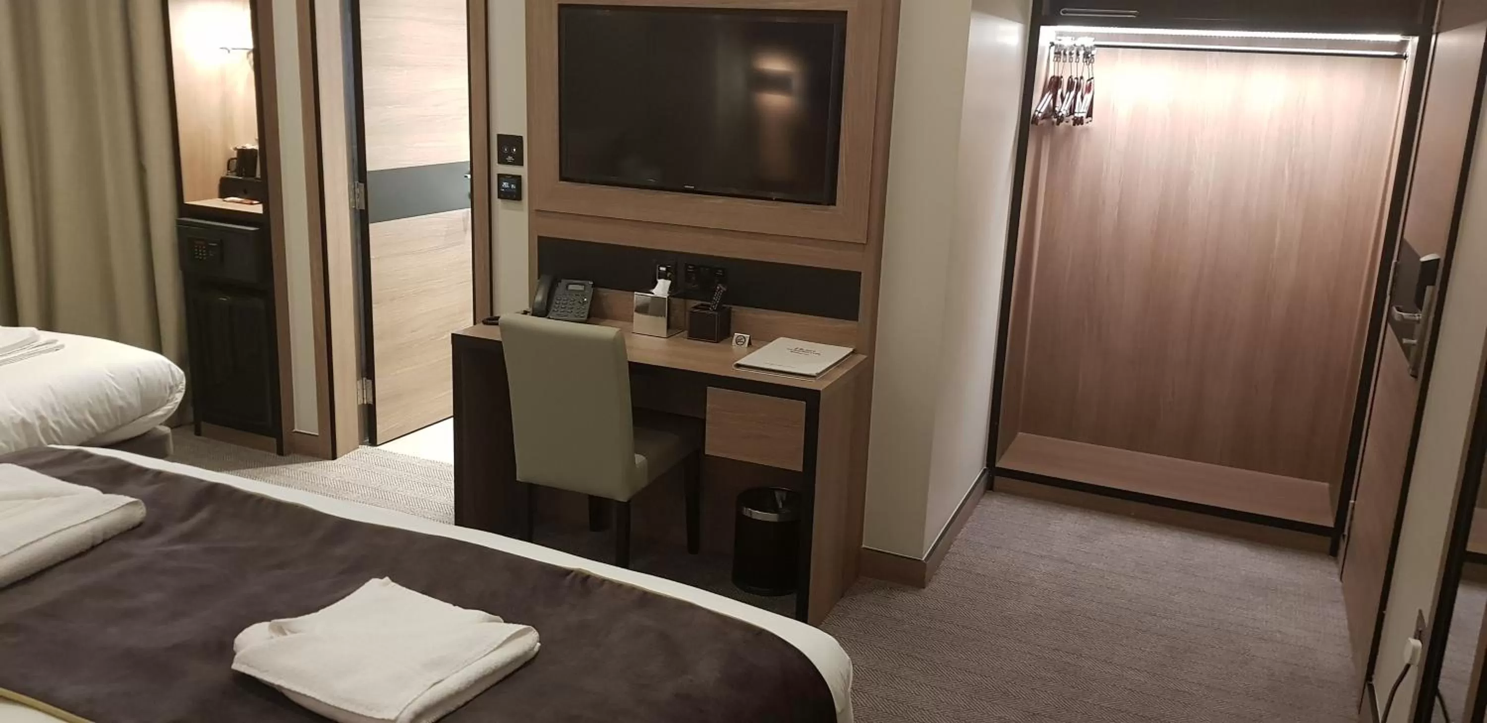 Bed in Merit Kensington Hotel