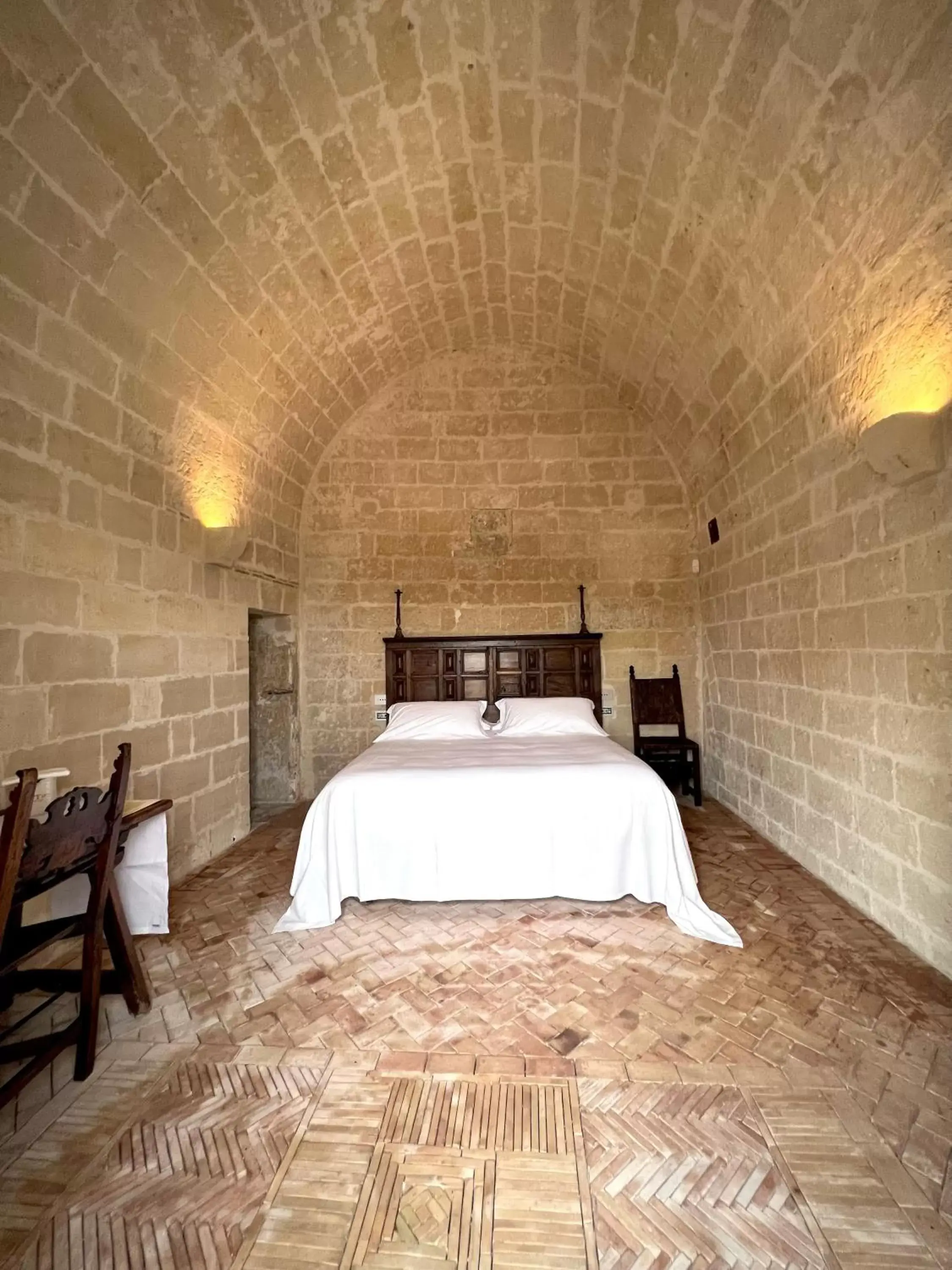 Bedroom in Sextantio Le Grotte Della Civita