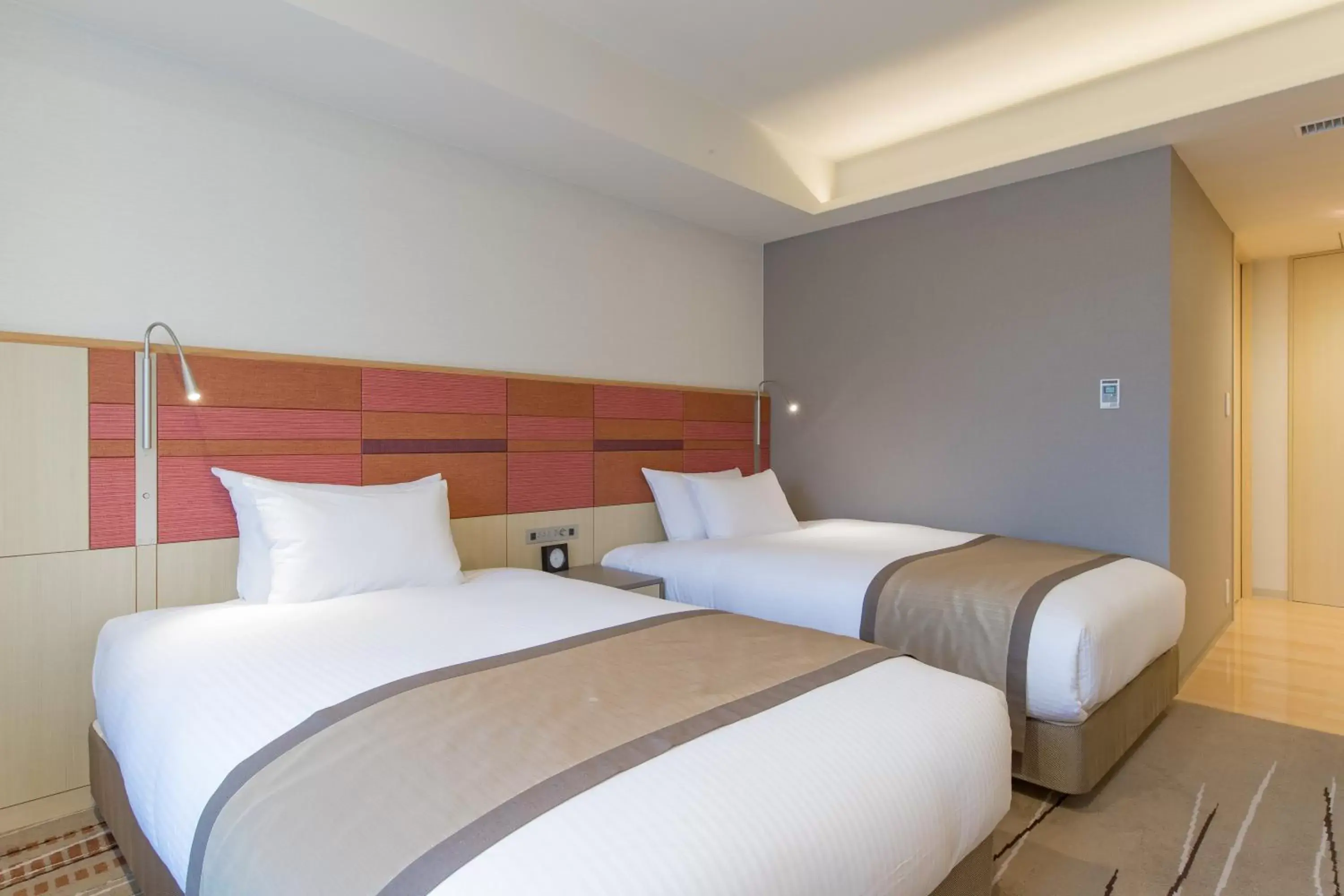 Photo of the whole room, Bed in JR Kyushu Hotel Blossom Hakata Central