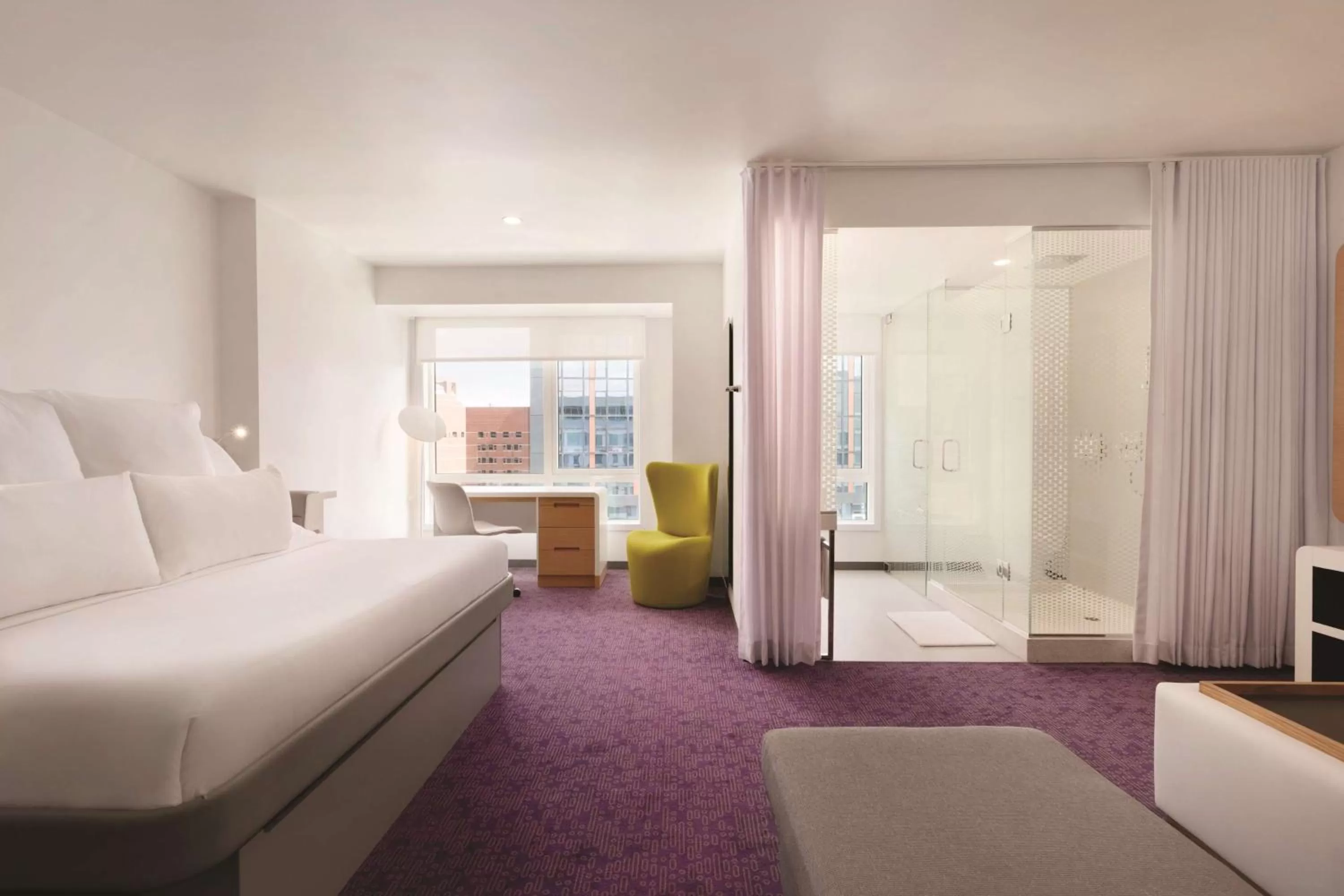 Photo of the whole room, Bed in YOTEL Boston