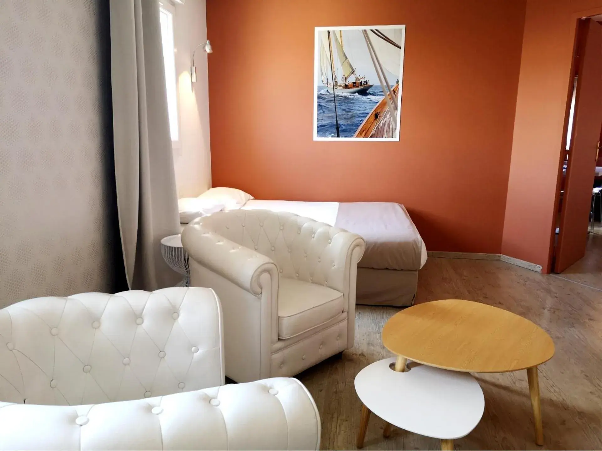 Bedroom, Seating Area in Hotel Grand Cap