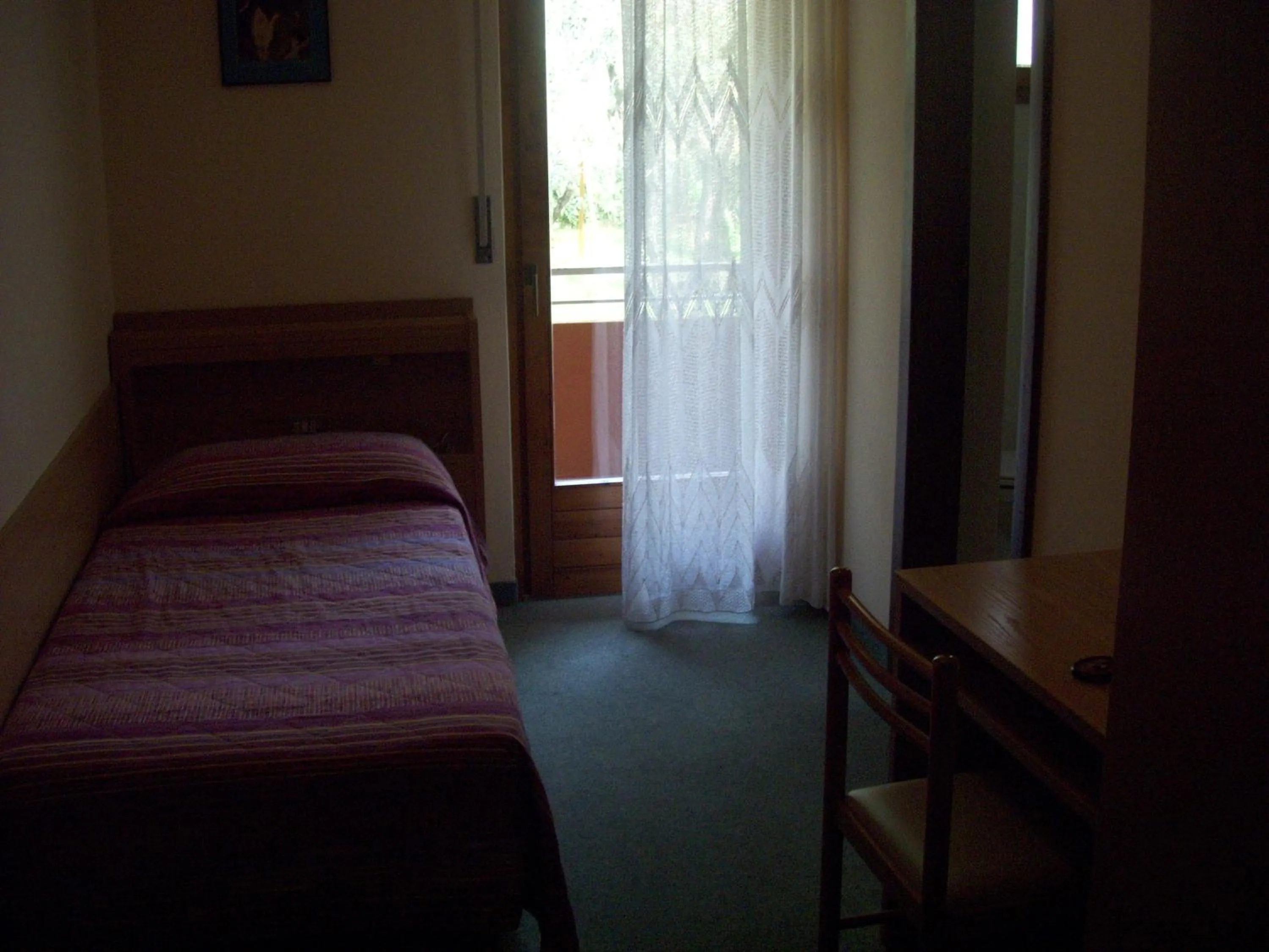 Decorative detail, Bed in Garnì Casa Rabagno