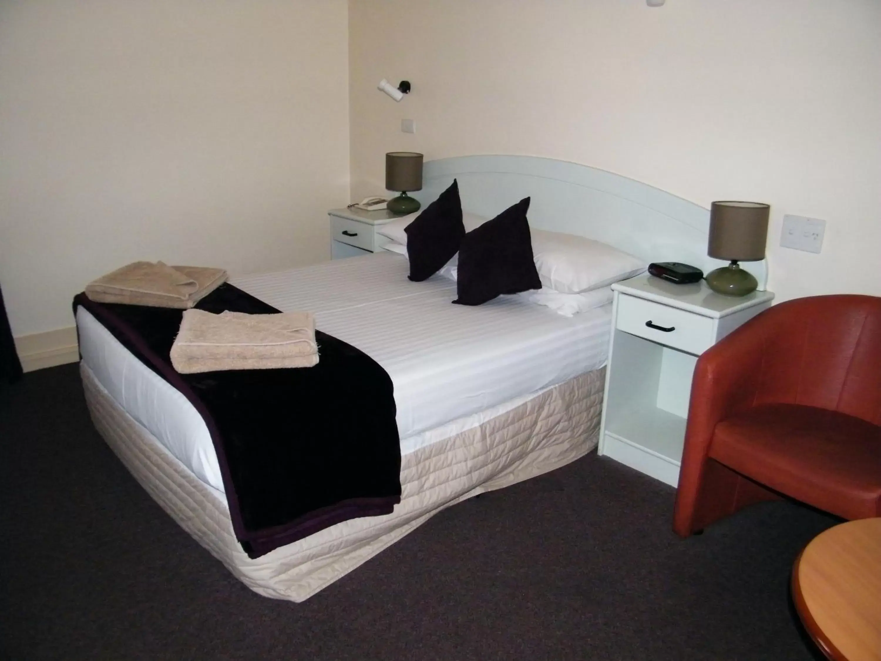 Bed in Grand Tasman Hotel