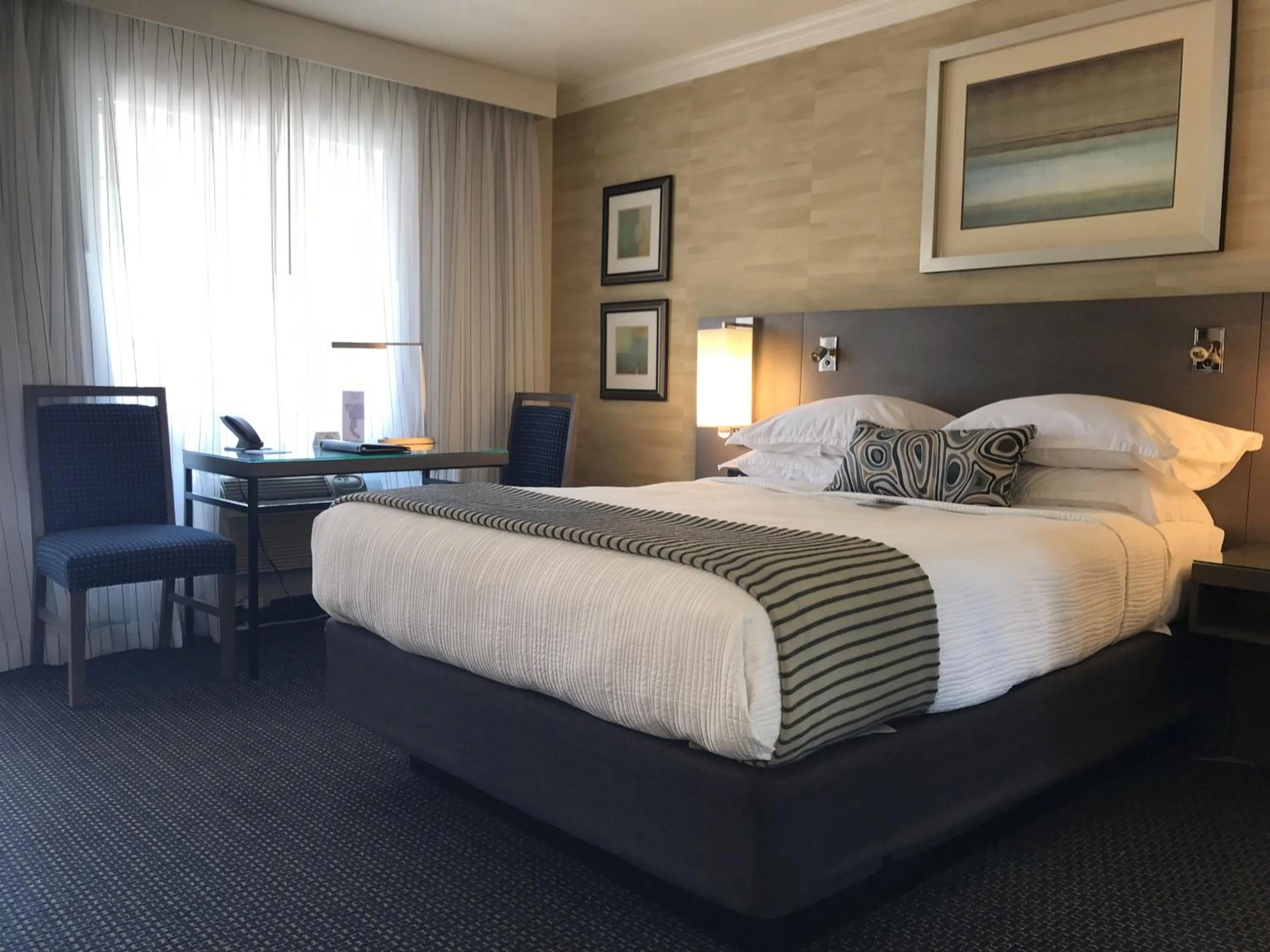 Bedroom, Bed in West Beach Inn, a Coast Hotel