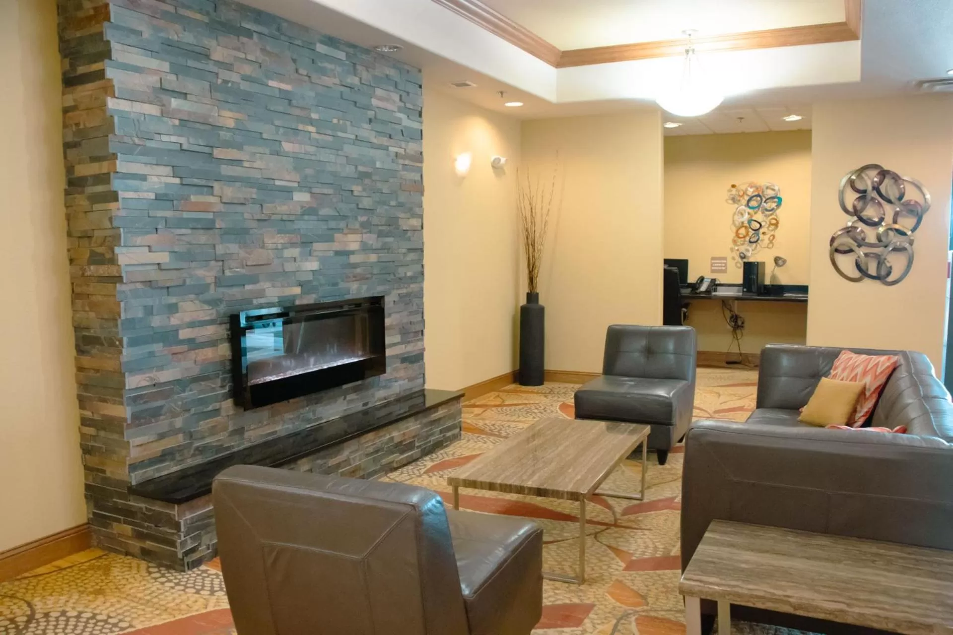 Communal lounge/ TV room in Expressway Suites of Grand Forks
