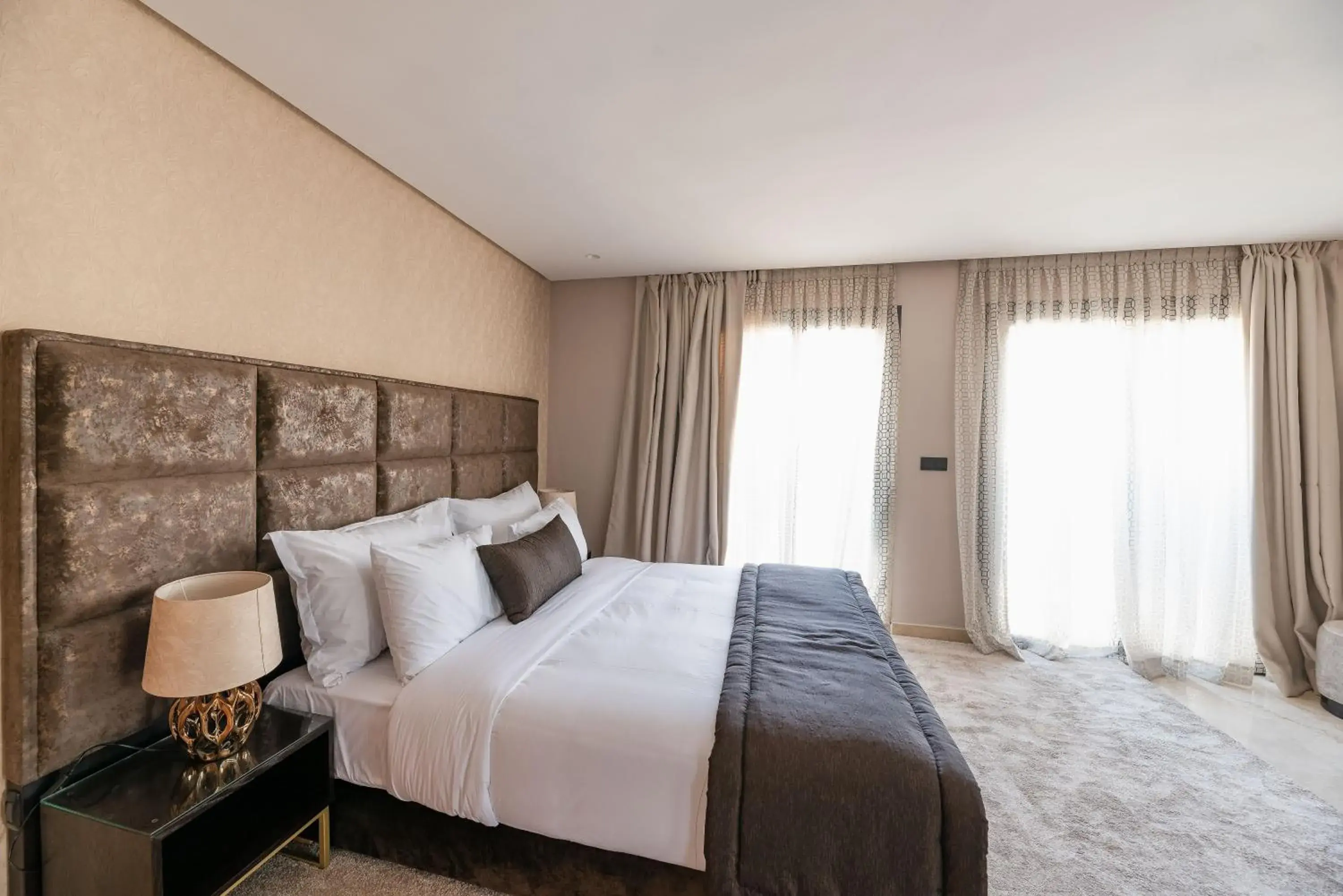 Bed in Avenue Suites & Appart Hotel Deluxe