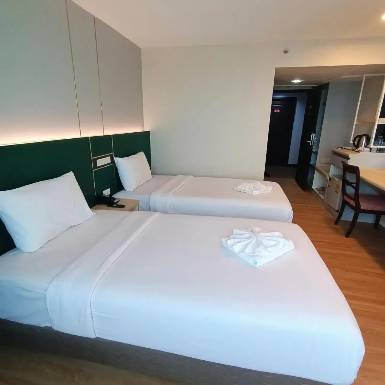 Bed in Mayflower Grande Hotel Phitsanulok