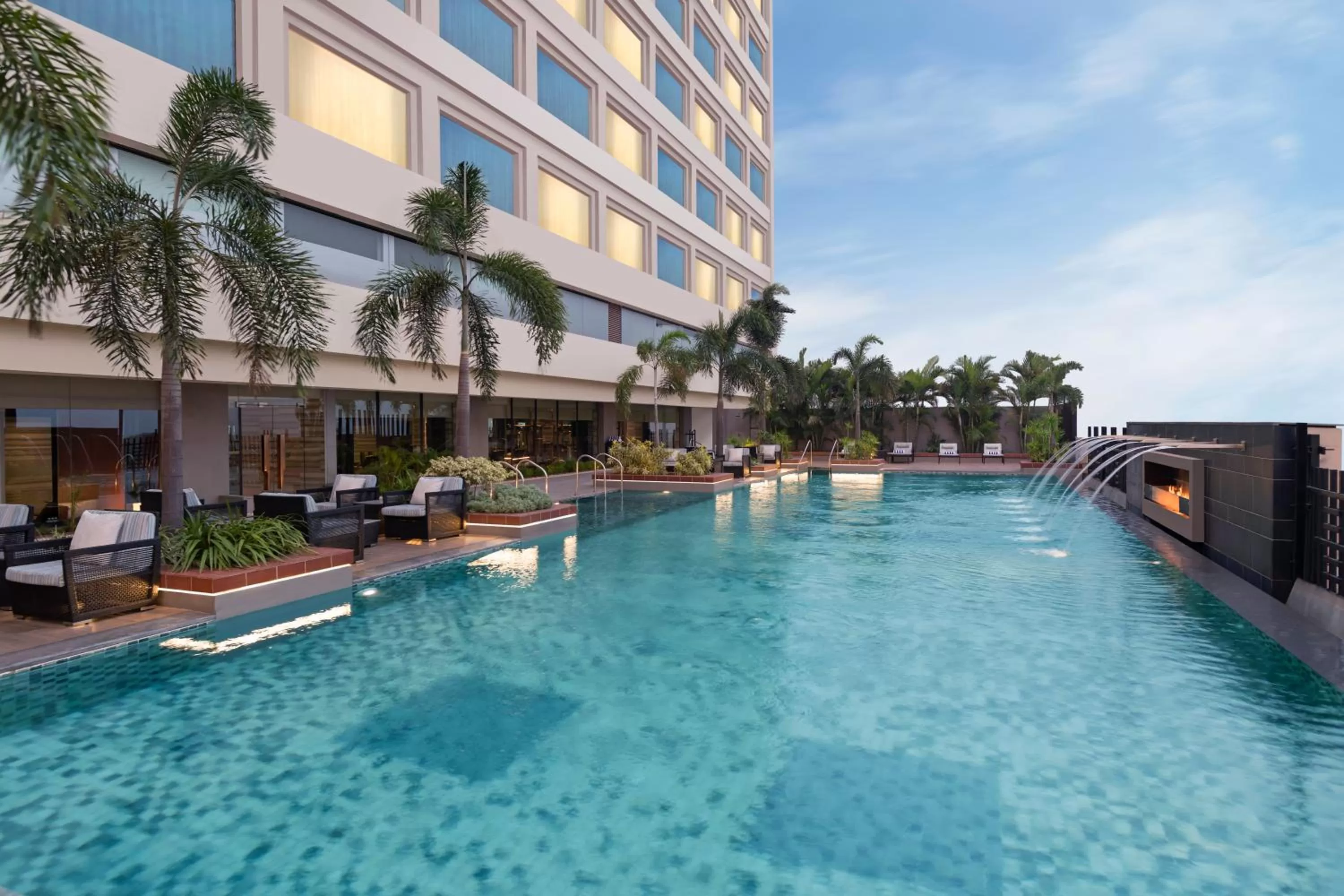 Swimming pool in Crowne Plaza New Delhi Mayur Vihar Noida by IHG