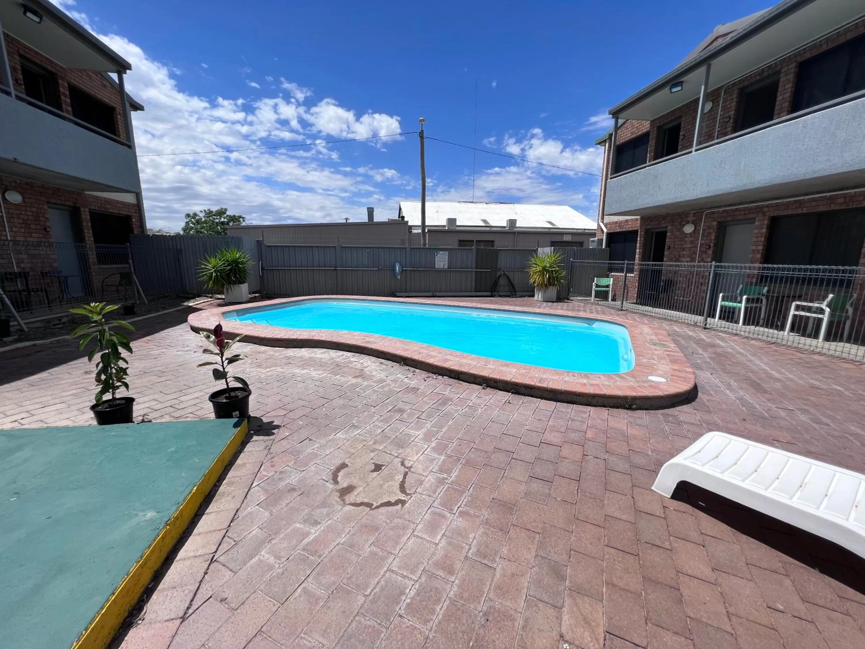 Swimming pool in Spa Village Travel Inn