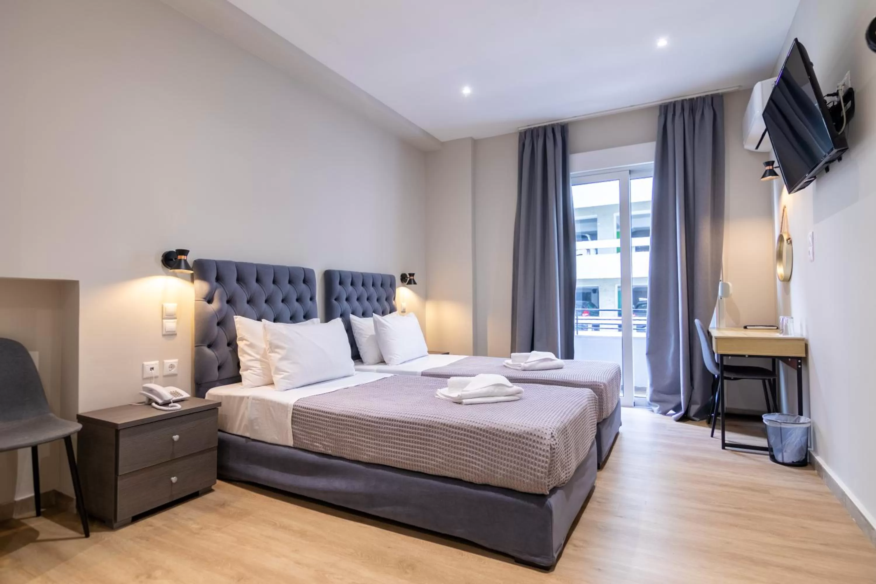 Bed in New Amaryllis Hotel