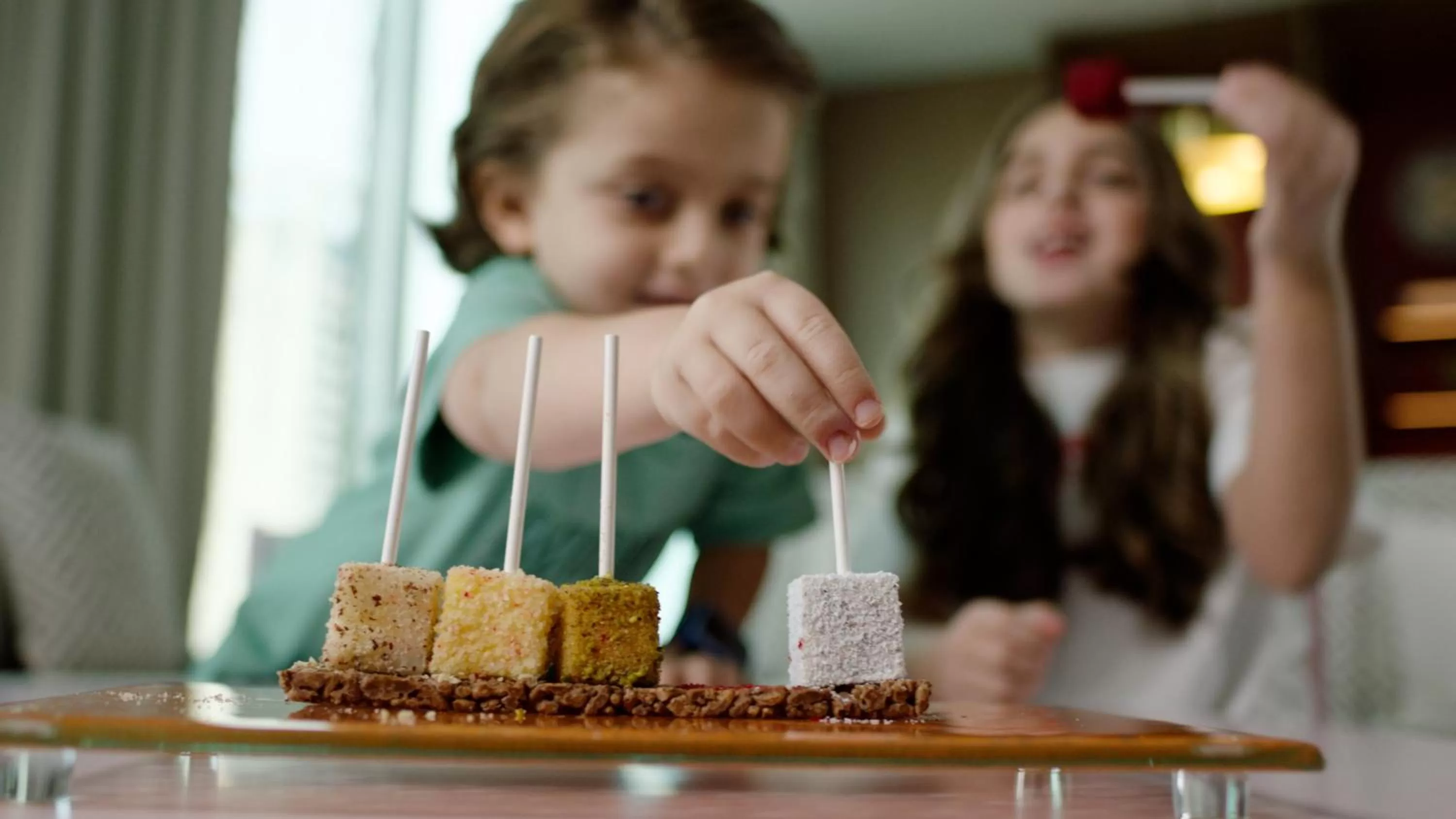 children in Four Seasons Hotel Kuwait at Burj Alshaya