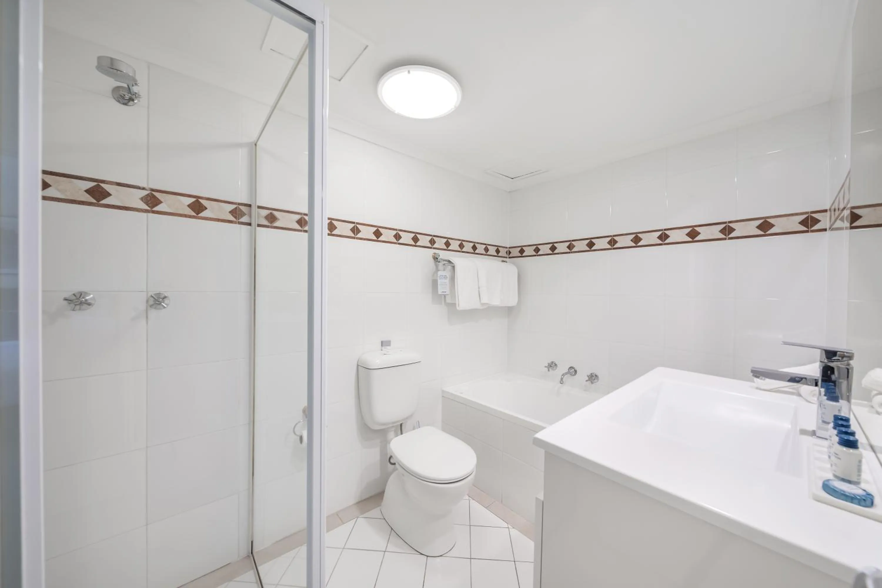 Shower in Oaks Sydney Castlereagh Suites