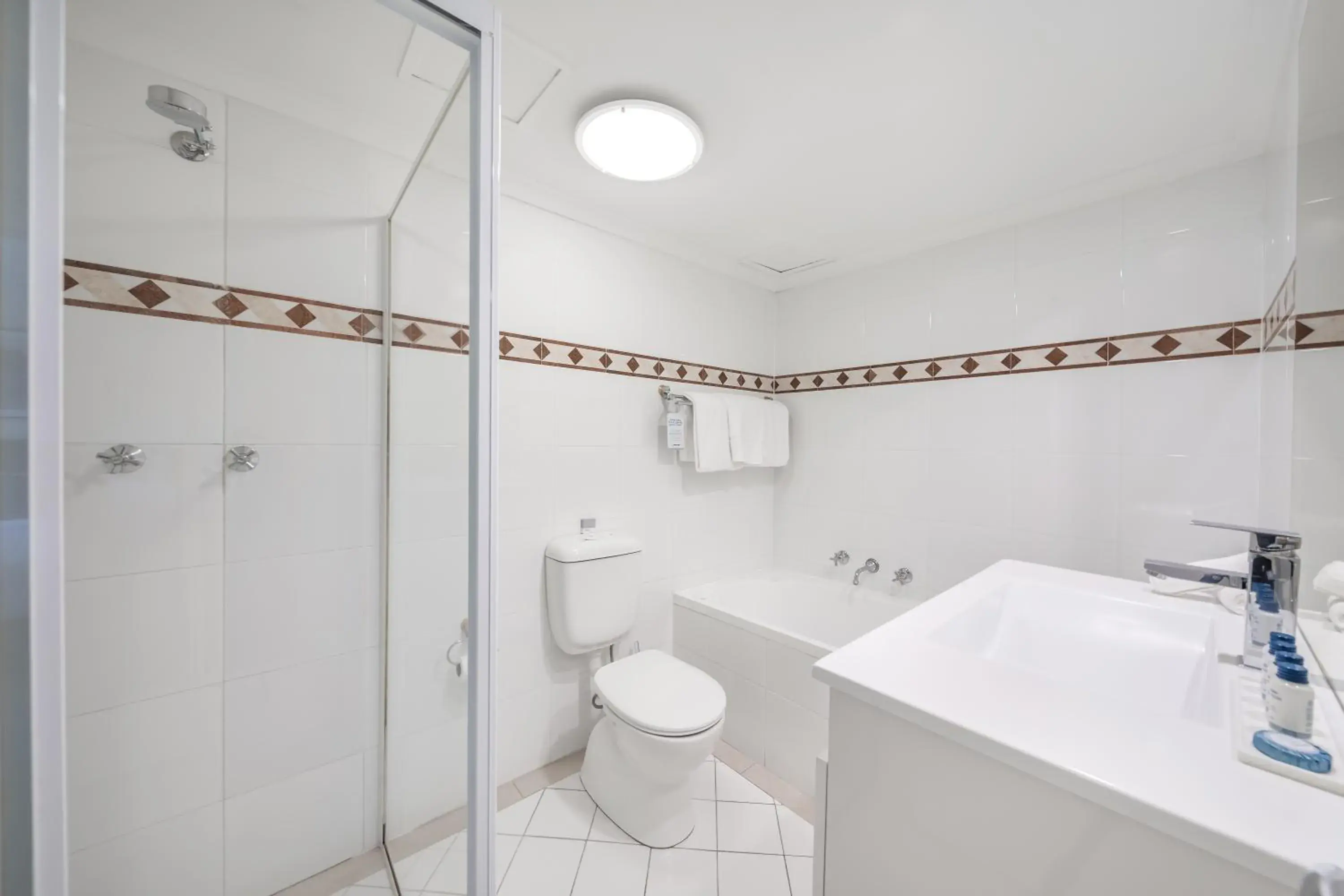 Shower, Bathroom in Oaks Sydney Castlereagh Suites