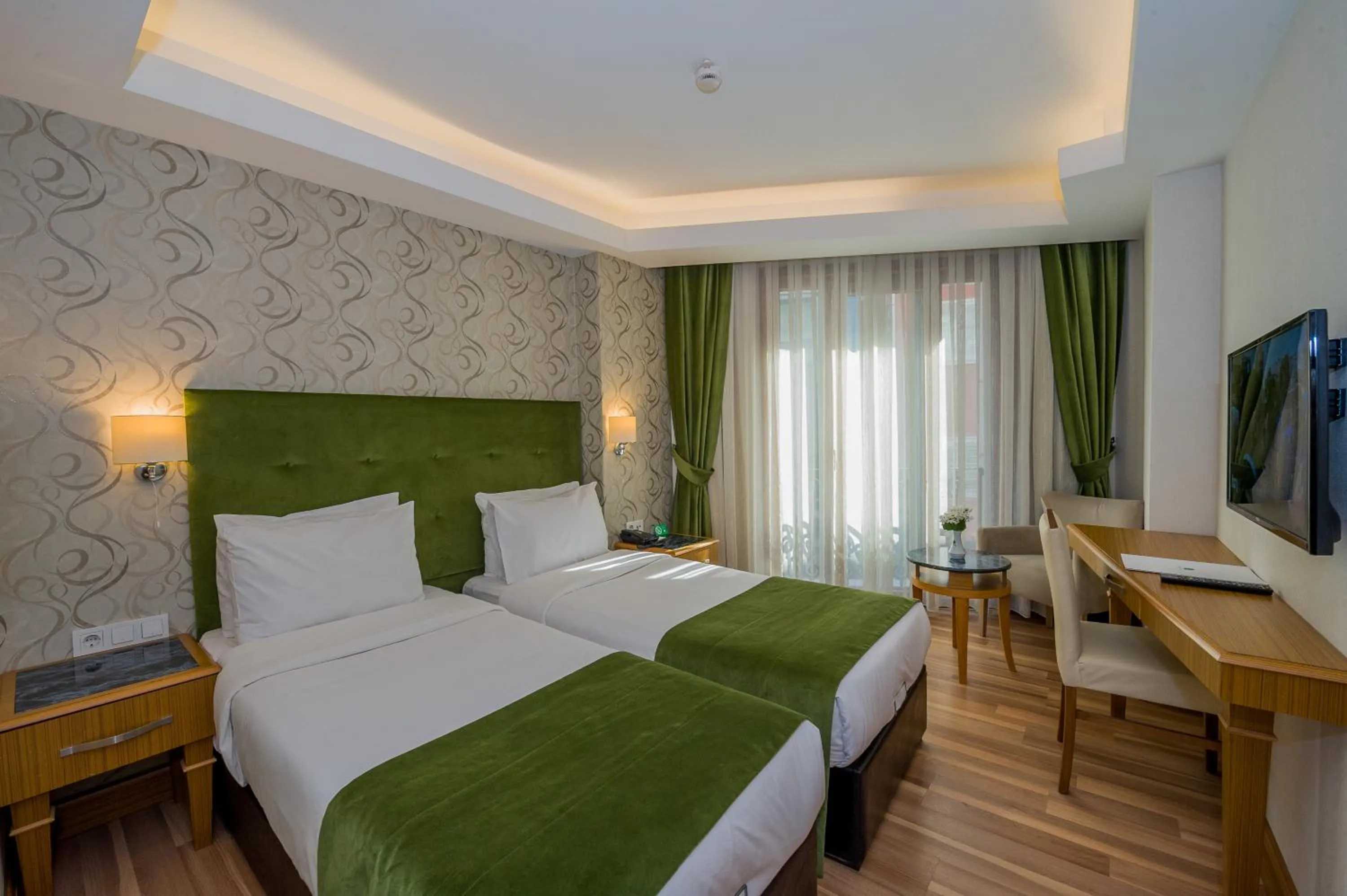 Bed in Bizim Hotel