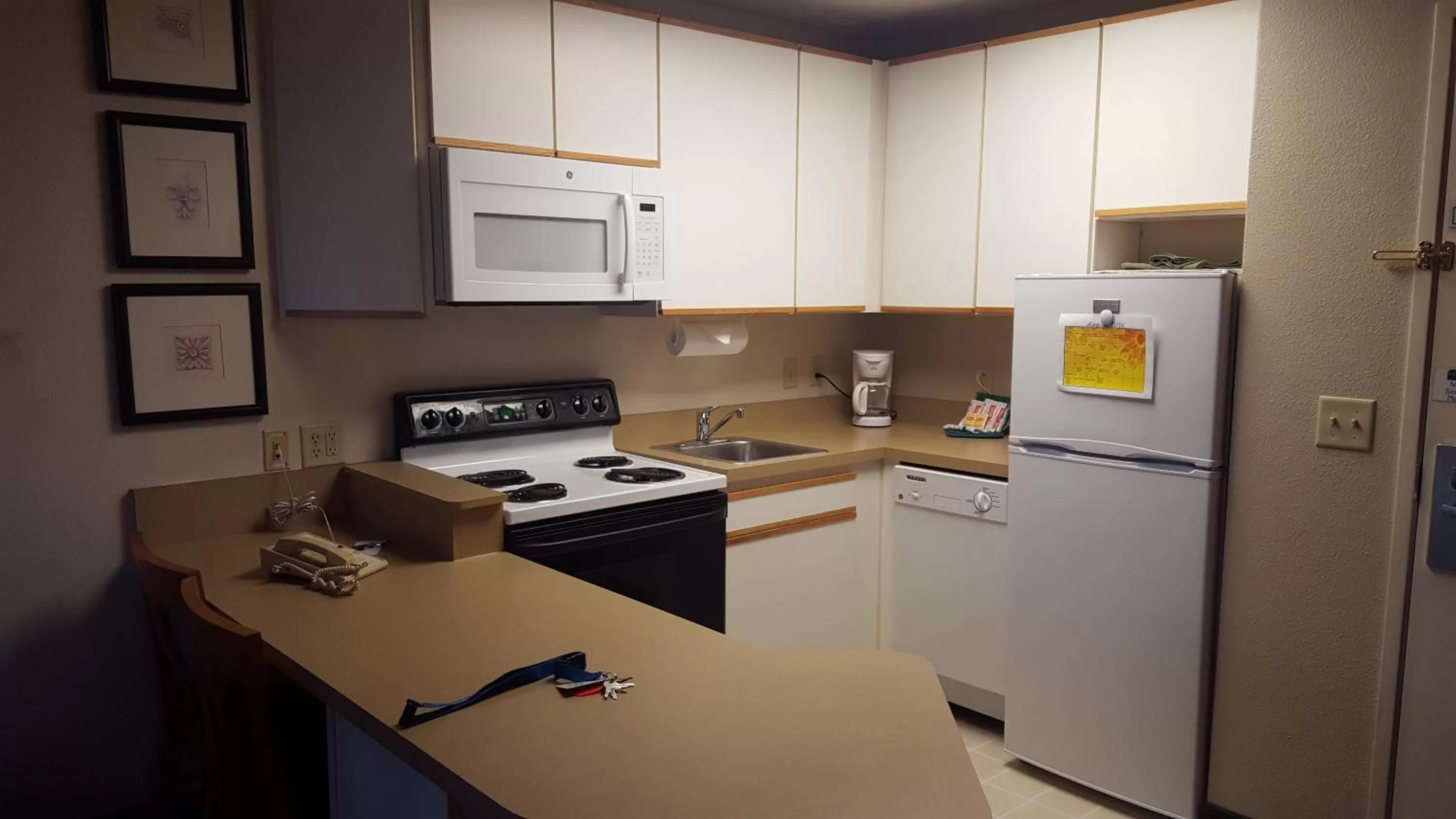 Kitchen or kitchenette in Baymont by Wyndham Wichita East