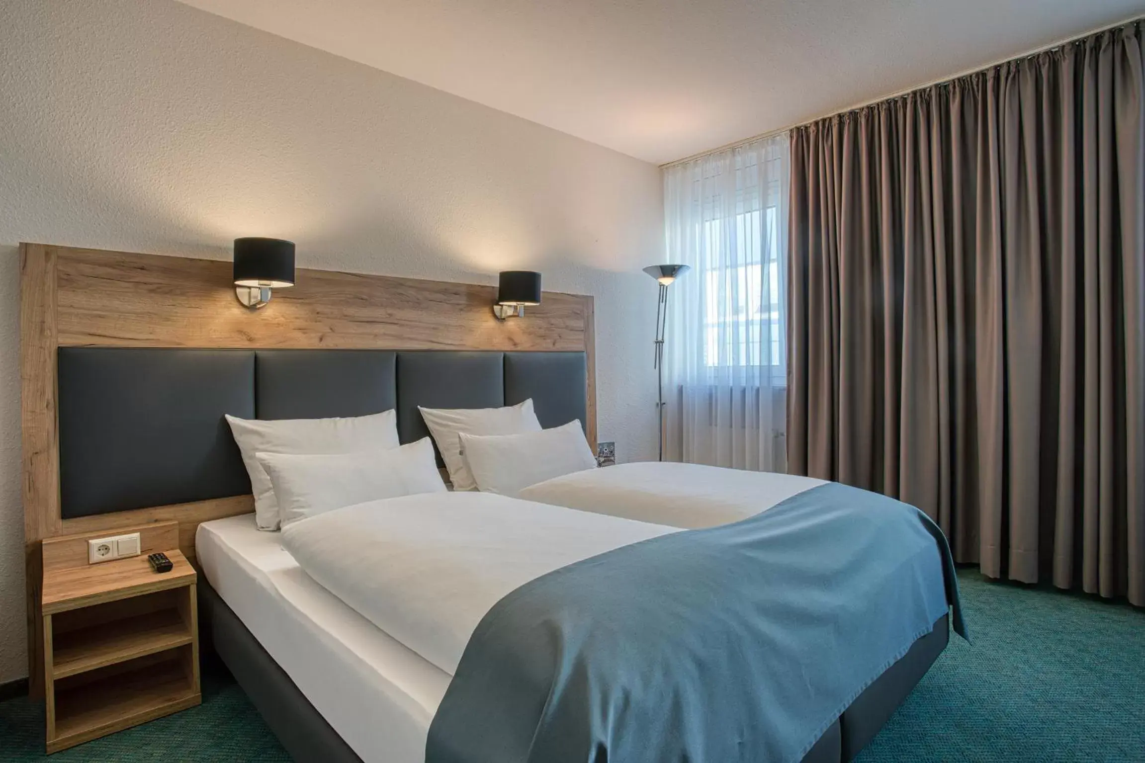 Photo of the whole room, Bed in Centro Hotel Böblingen
