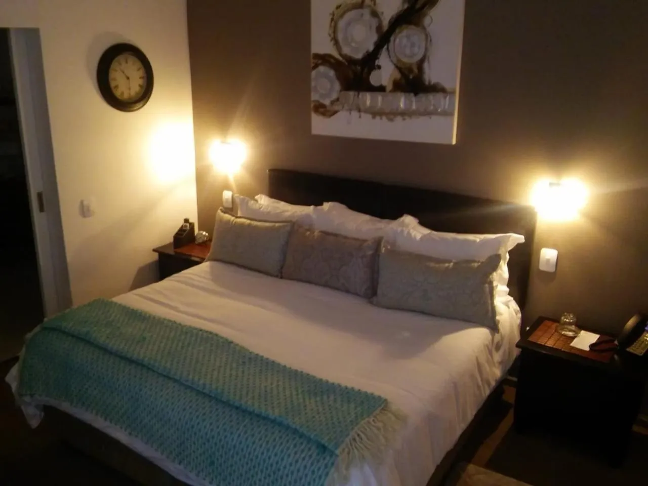 Bed in Point B Guest House -Sustainable Solar Energy