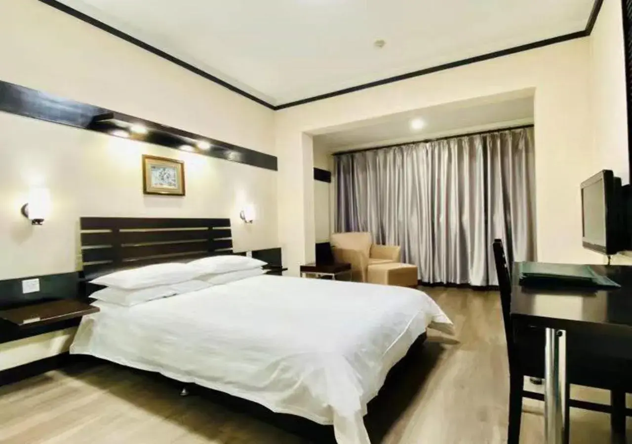 Bed in Ying Yuan Hotel