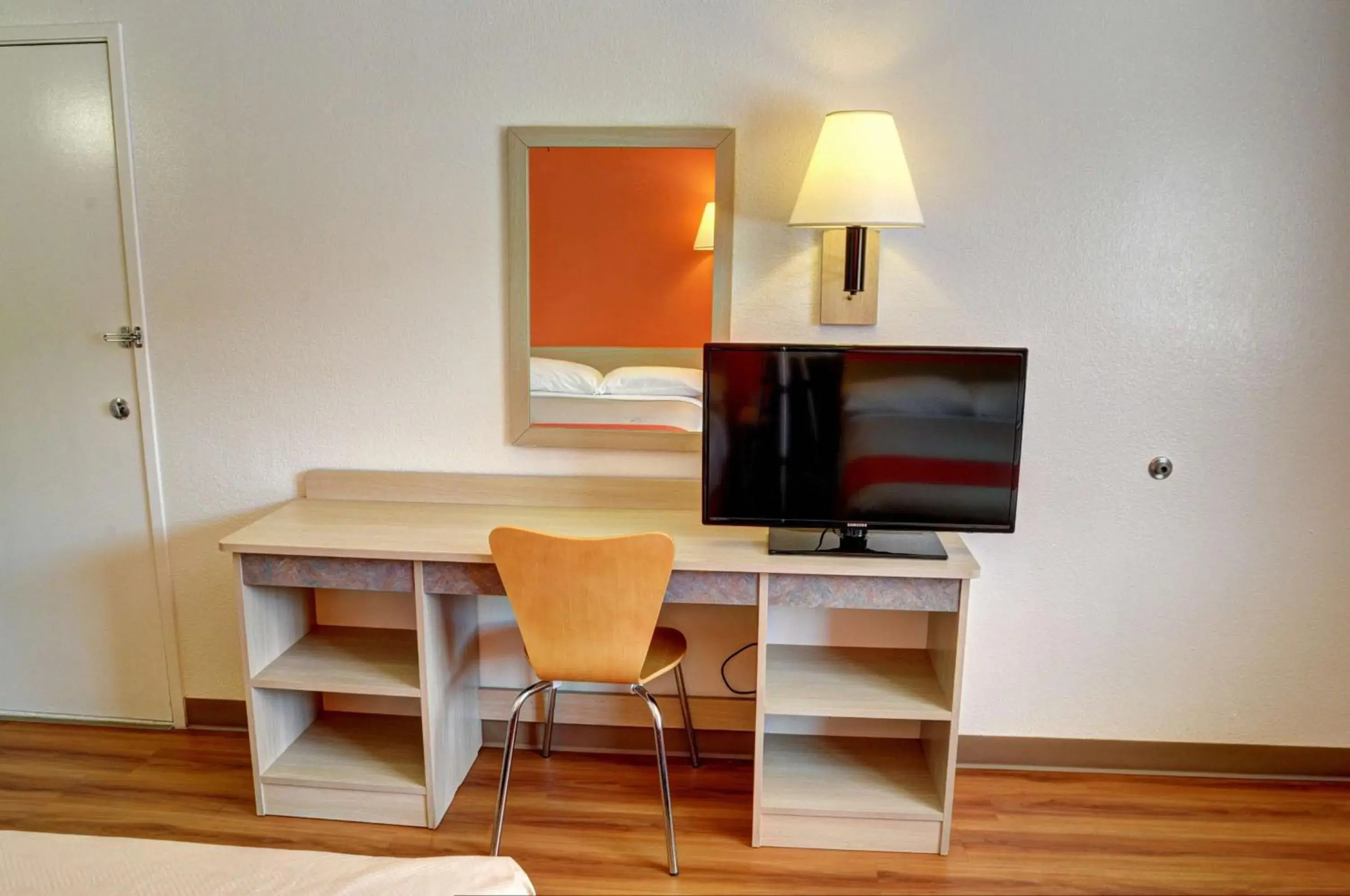 Photo of the whole room, TV/Entertainment Center in Motel 6-Slidell, LA - New Orleans