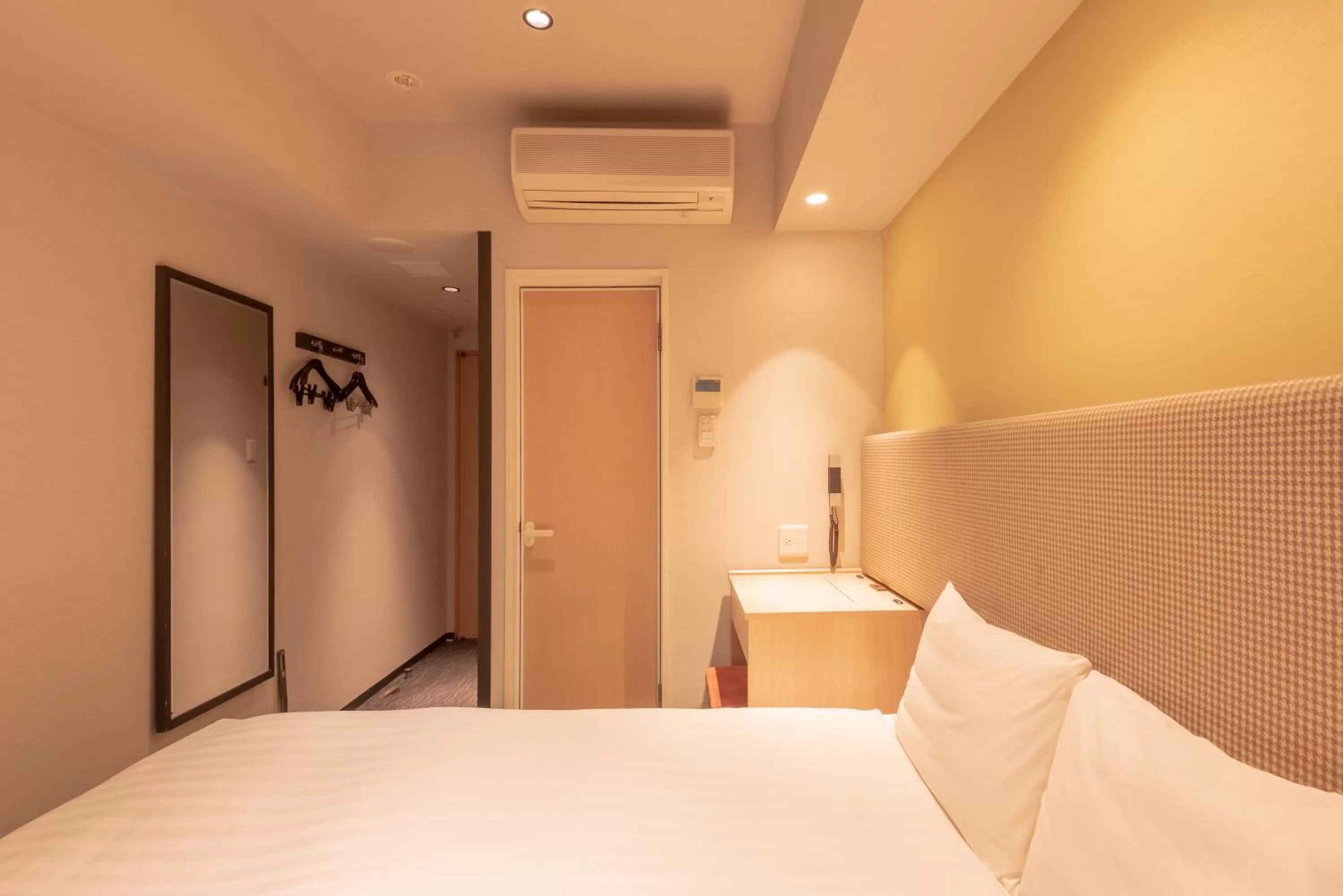 Bed in E Hotel Higashi Shinjuku