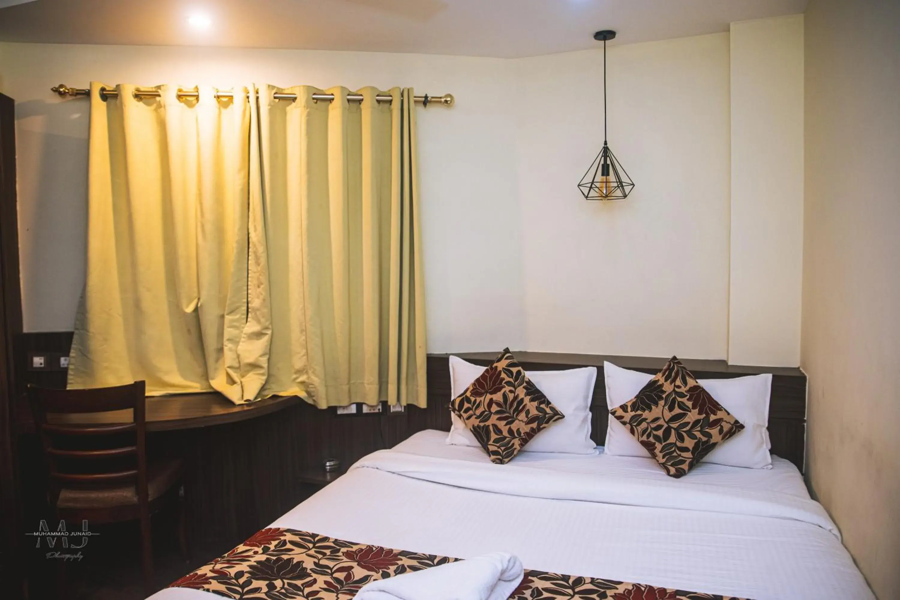 Bed in Rajdarbar Hotel & Banquets