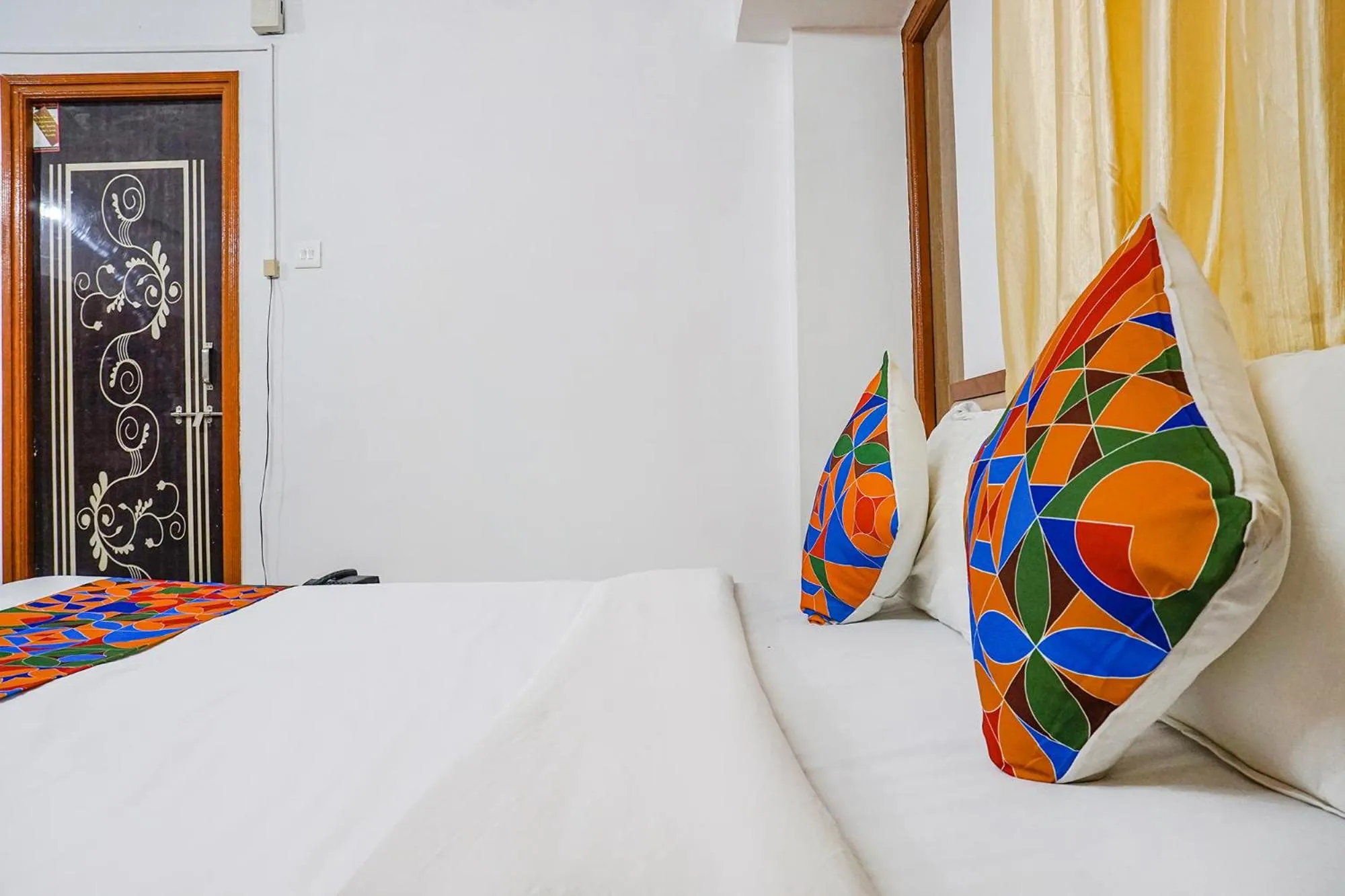 Bed in FabHotel Lake View - Chinmaya Vitthal Mandir