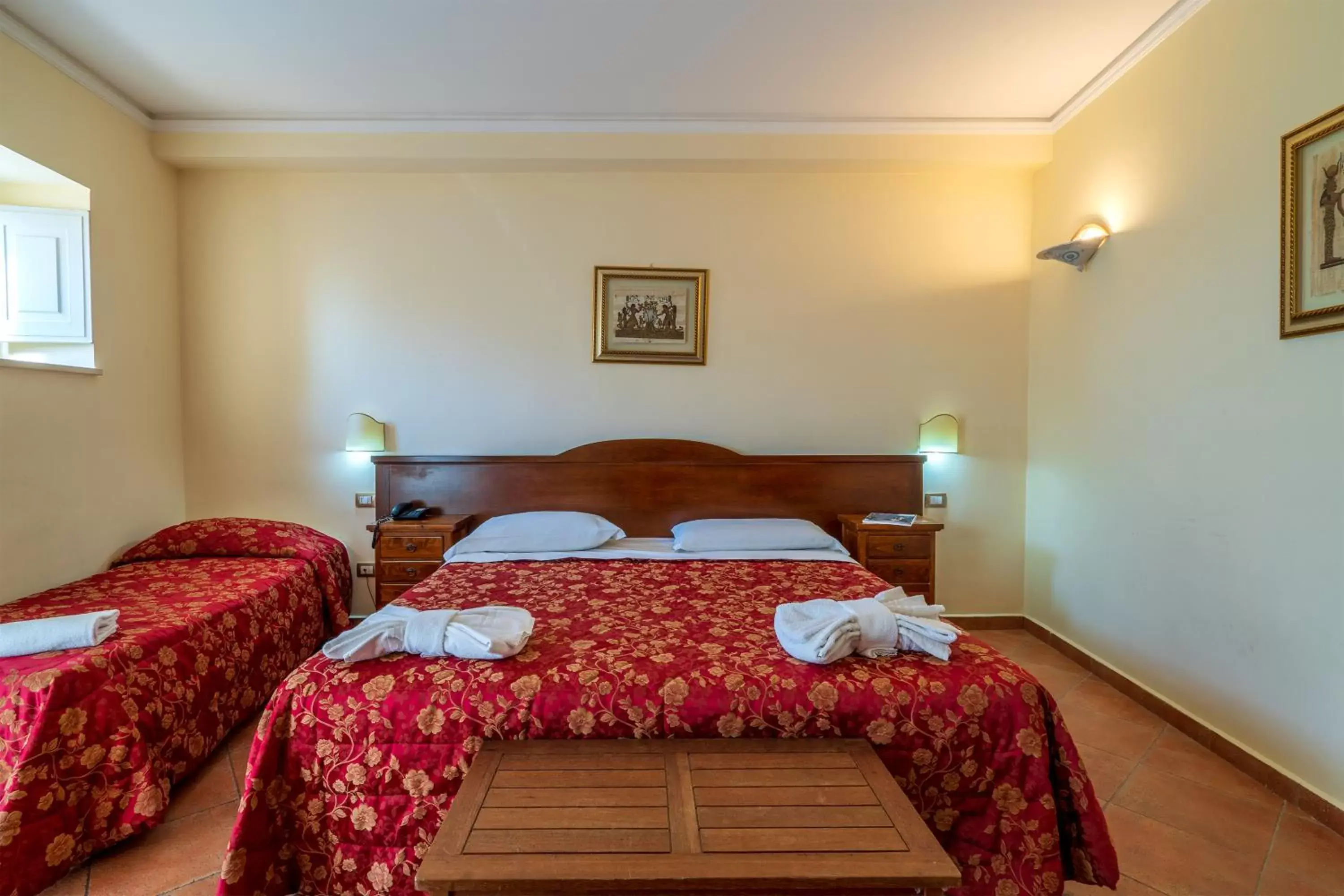 Bed in Hotel Mediterraneo