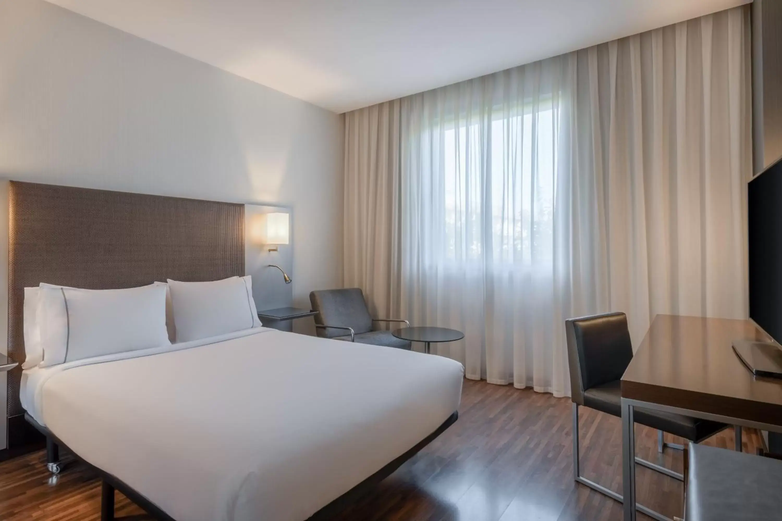 Photo of the whole room, Bed in AC Hotel Coslada Aeropuerto by Marriott