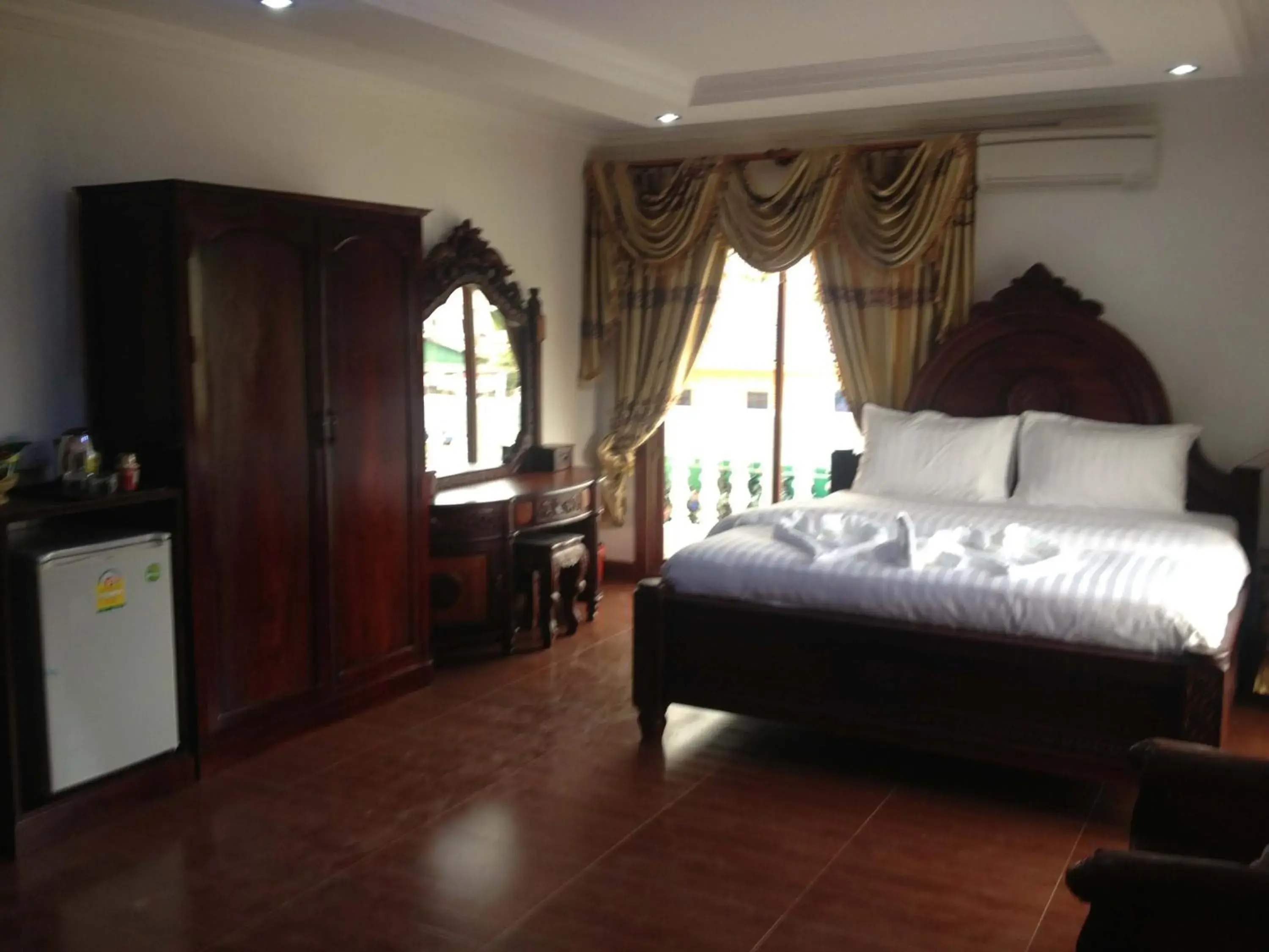 Decorative detail, Bed in Emerald Bb Battambang Hotel