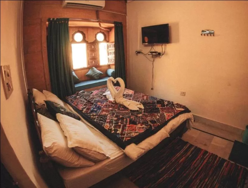 Bed in Hotel Murad Haveli