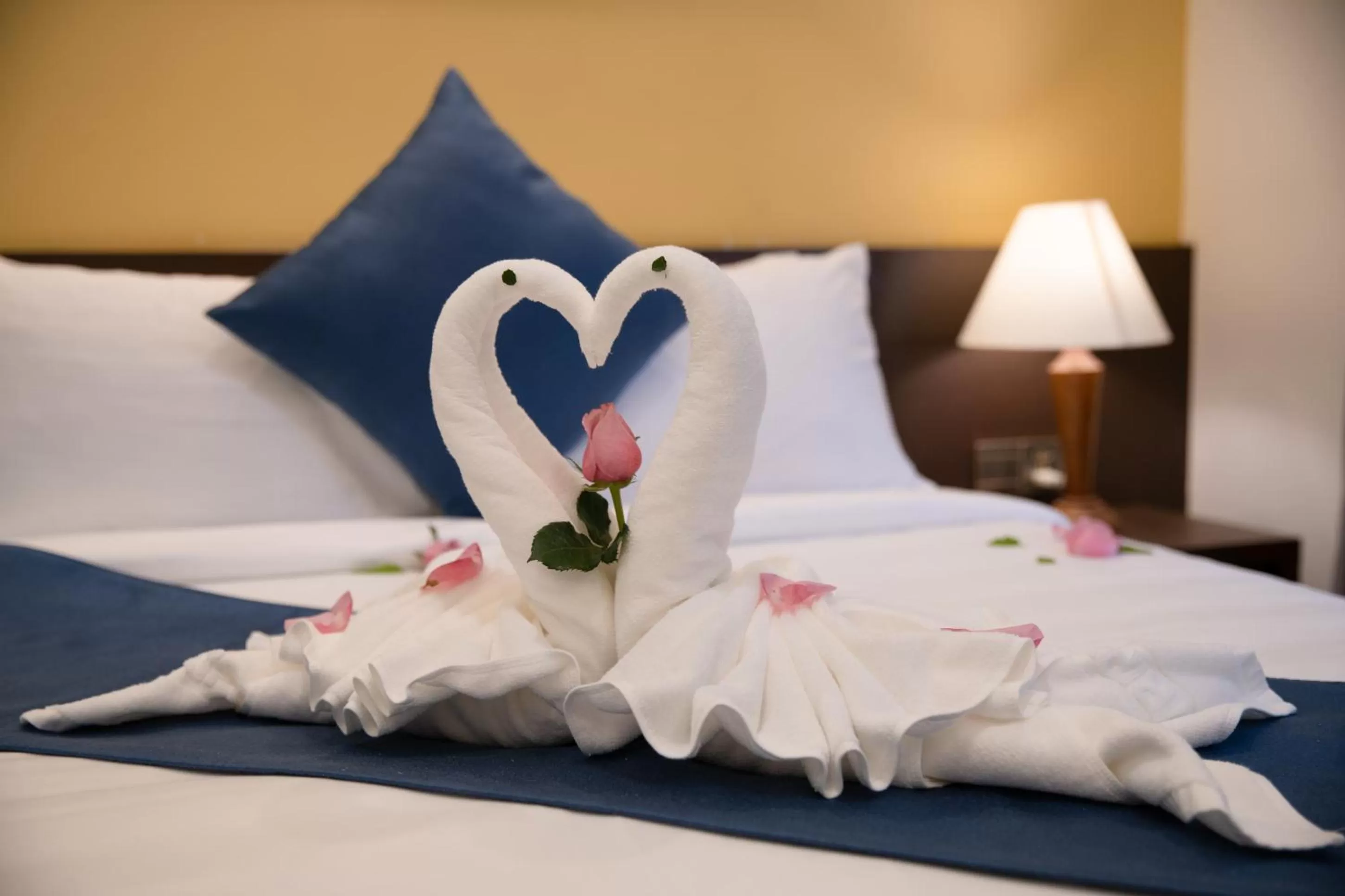 Decorative detail, Bed in TRIPLE Riverside Villa Hotel HoiAn