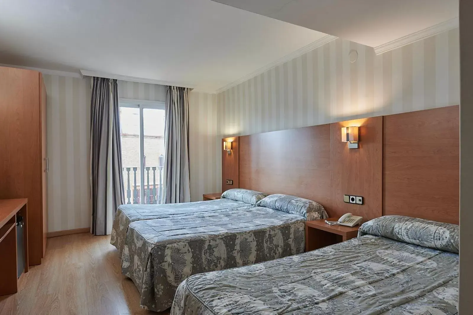 Bed in Ramblas Hotel