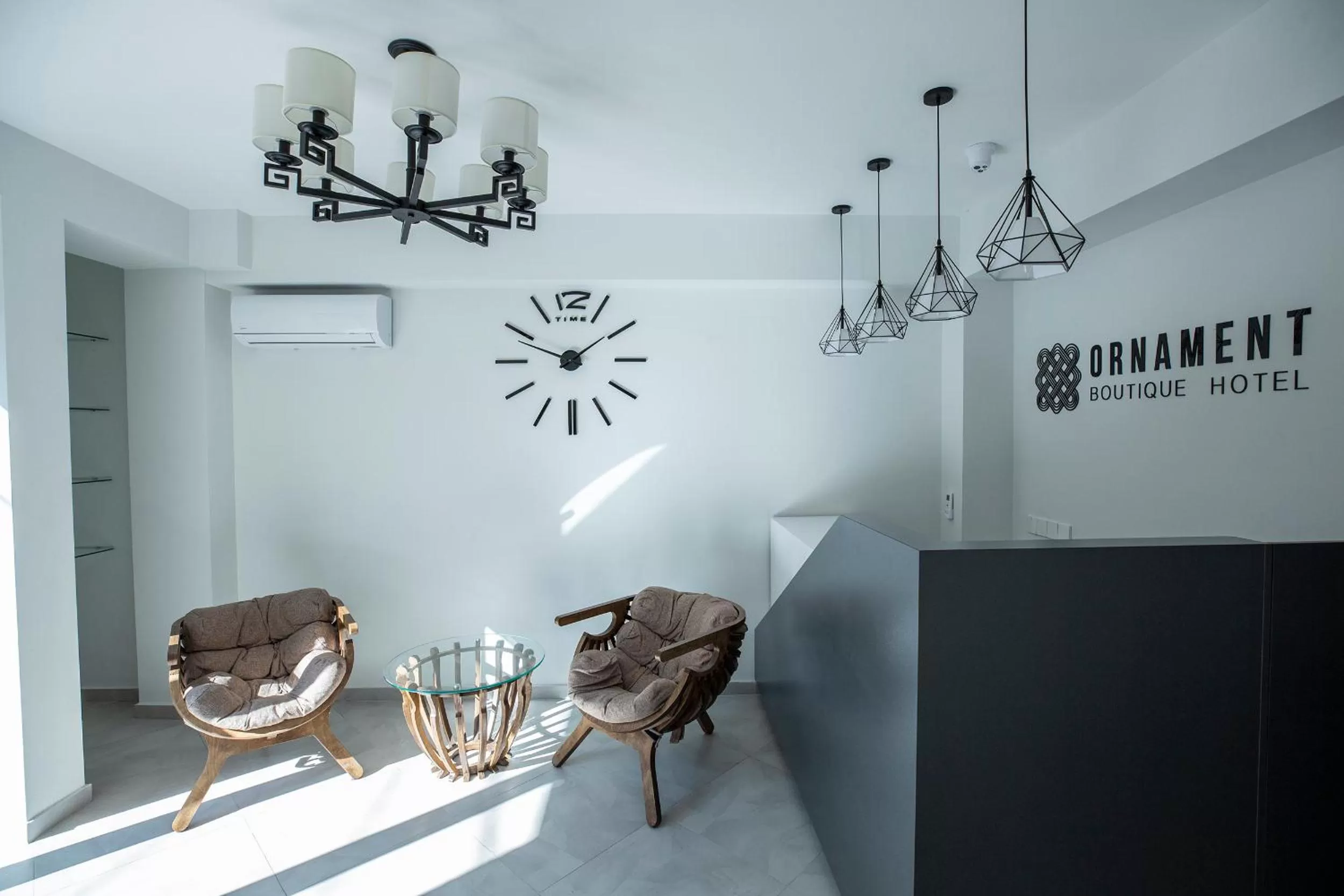 Property logo or sign in Ornament Boutique Hotel