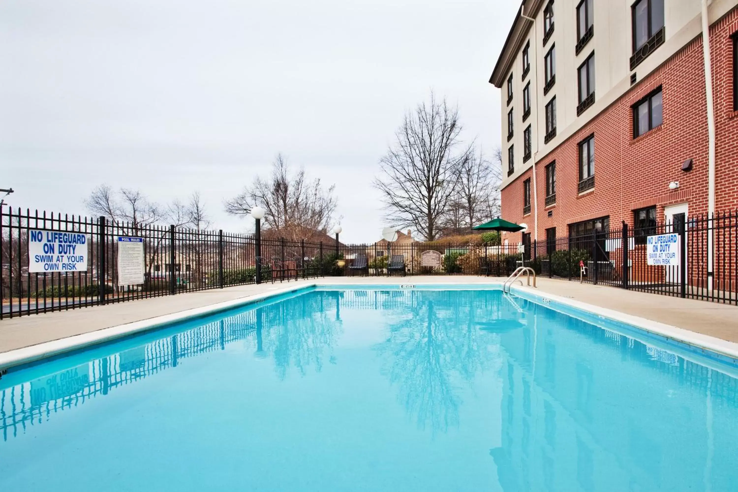 Swimming Pool in Holiday Inn Express Hotel & Suites Greenville-Downtown, an IHG Hotel