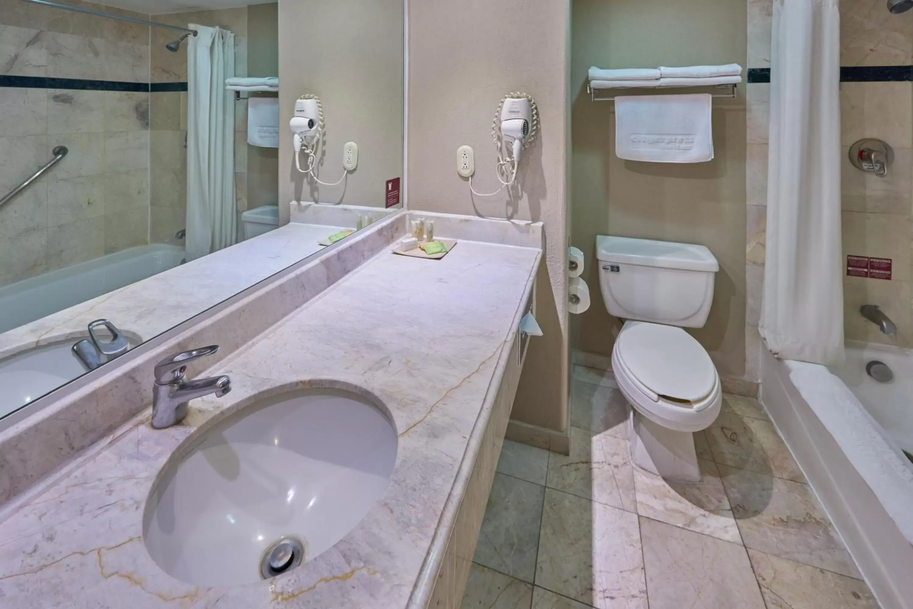 Bathroom in Sierra Suites By HP Hotels