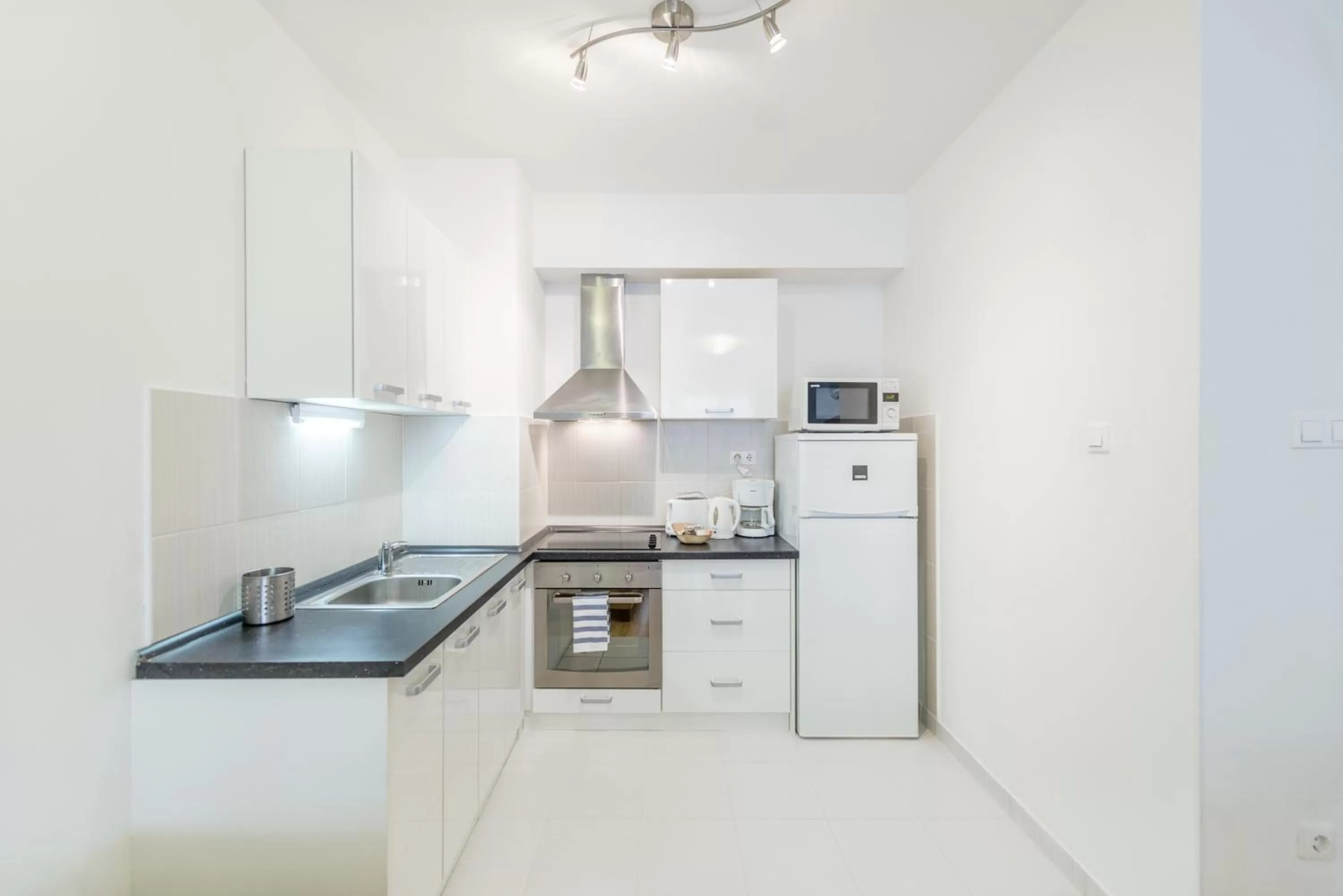 Kitchen or kitchenette in Prince Apartments