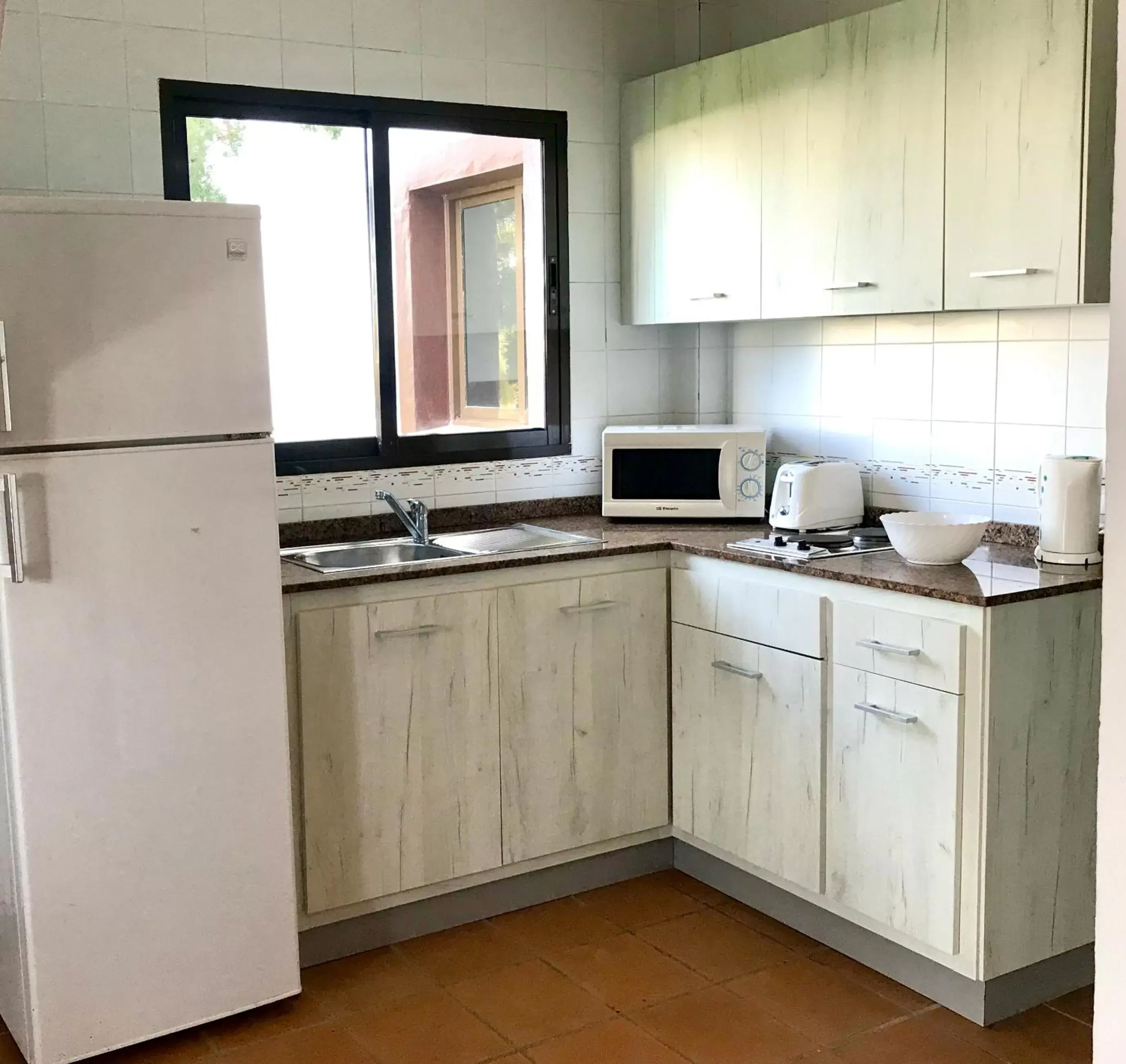 Kitchen or kitchenette, Kitchen/Kitchenette in Nuramar Resort & Villas