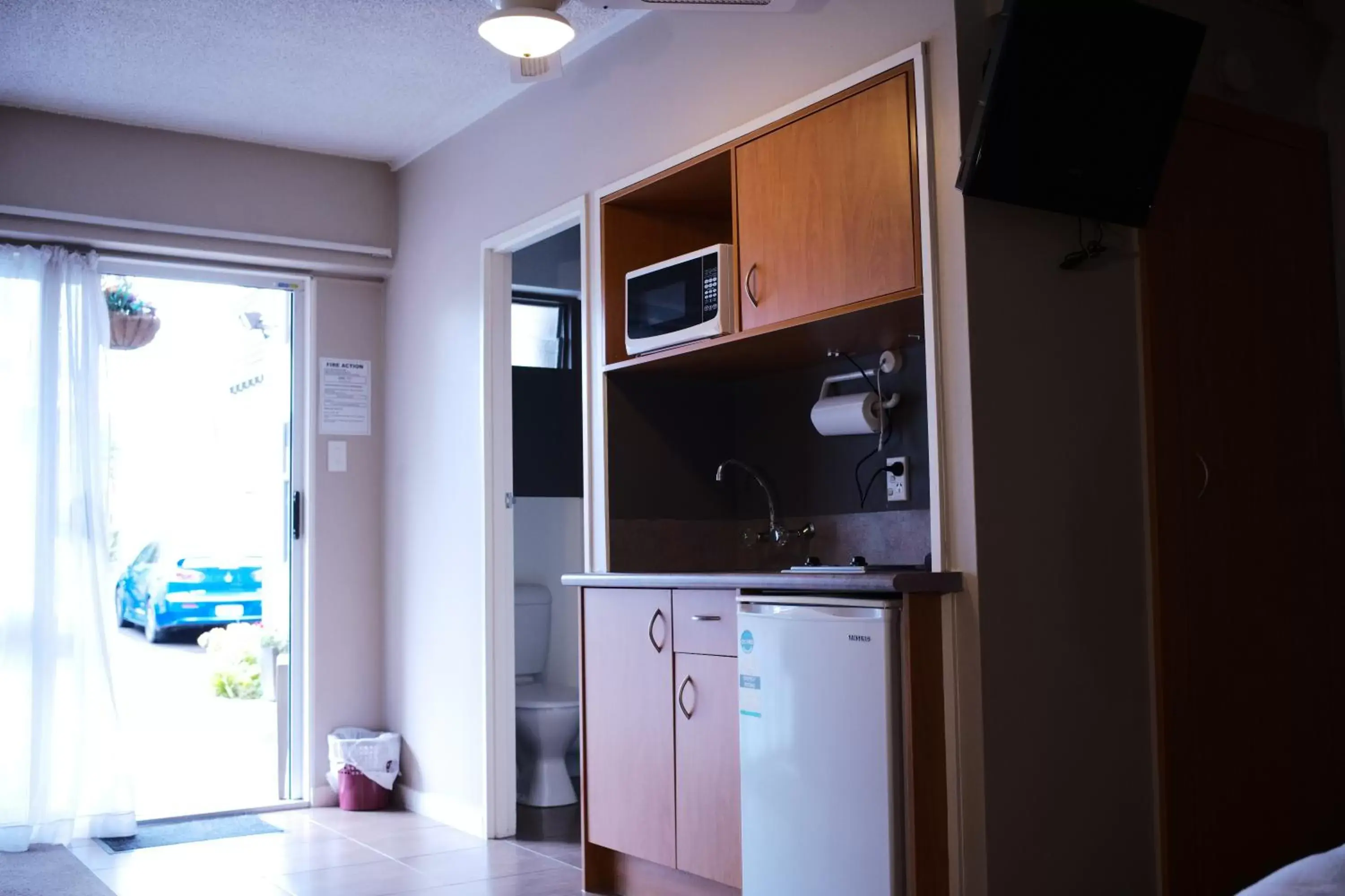 Kitchen/Kitchenette in Kiwi Studios Motel