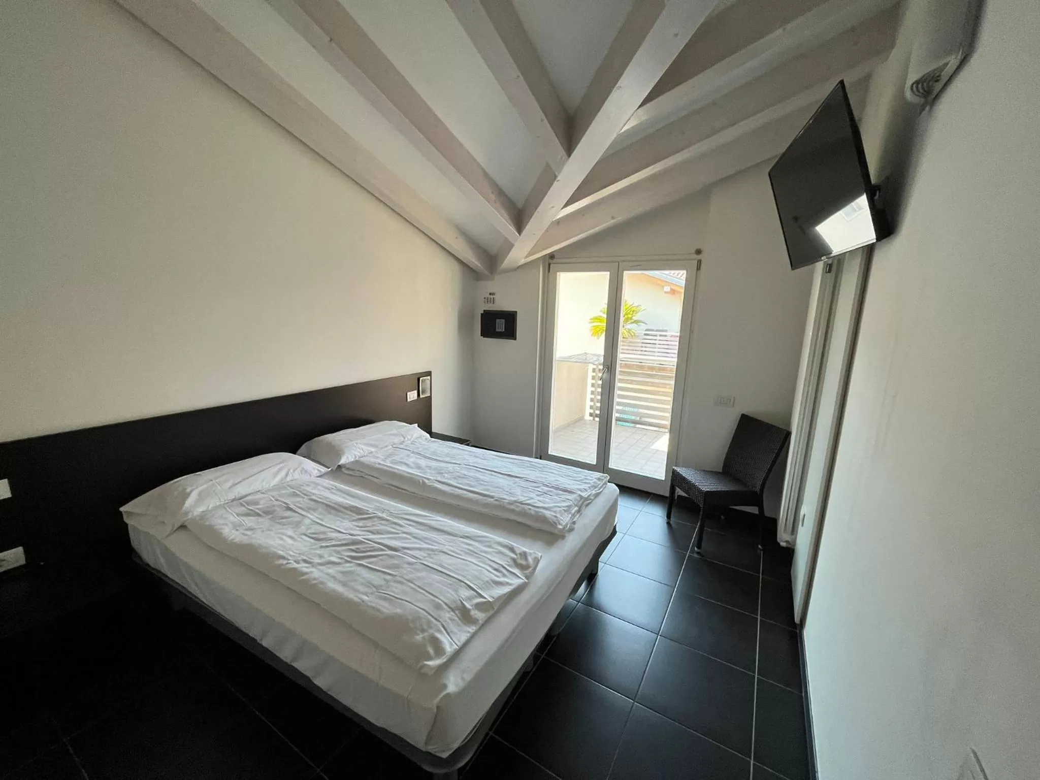 Bed in 4 Limoni Apartment Resort