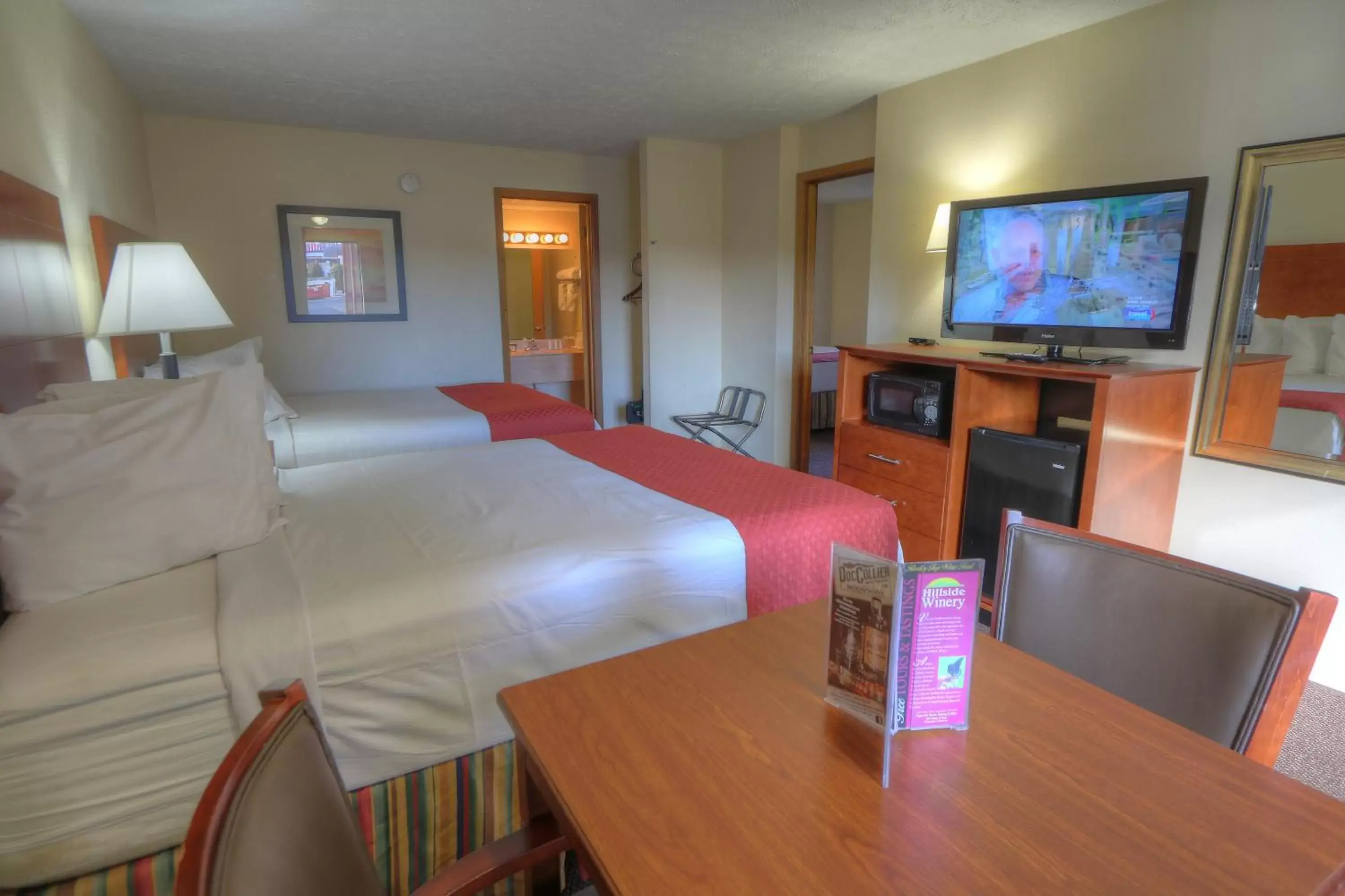 Photo of the whole room, TV/Entertainment Center in Days Inn By Wyndham Pigeon Forge South