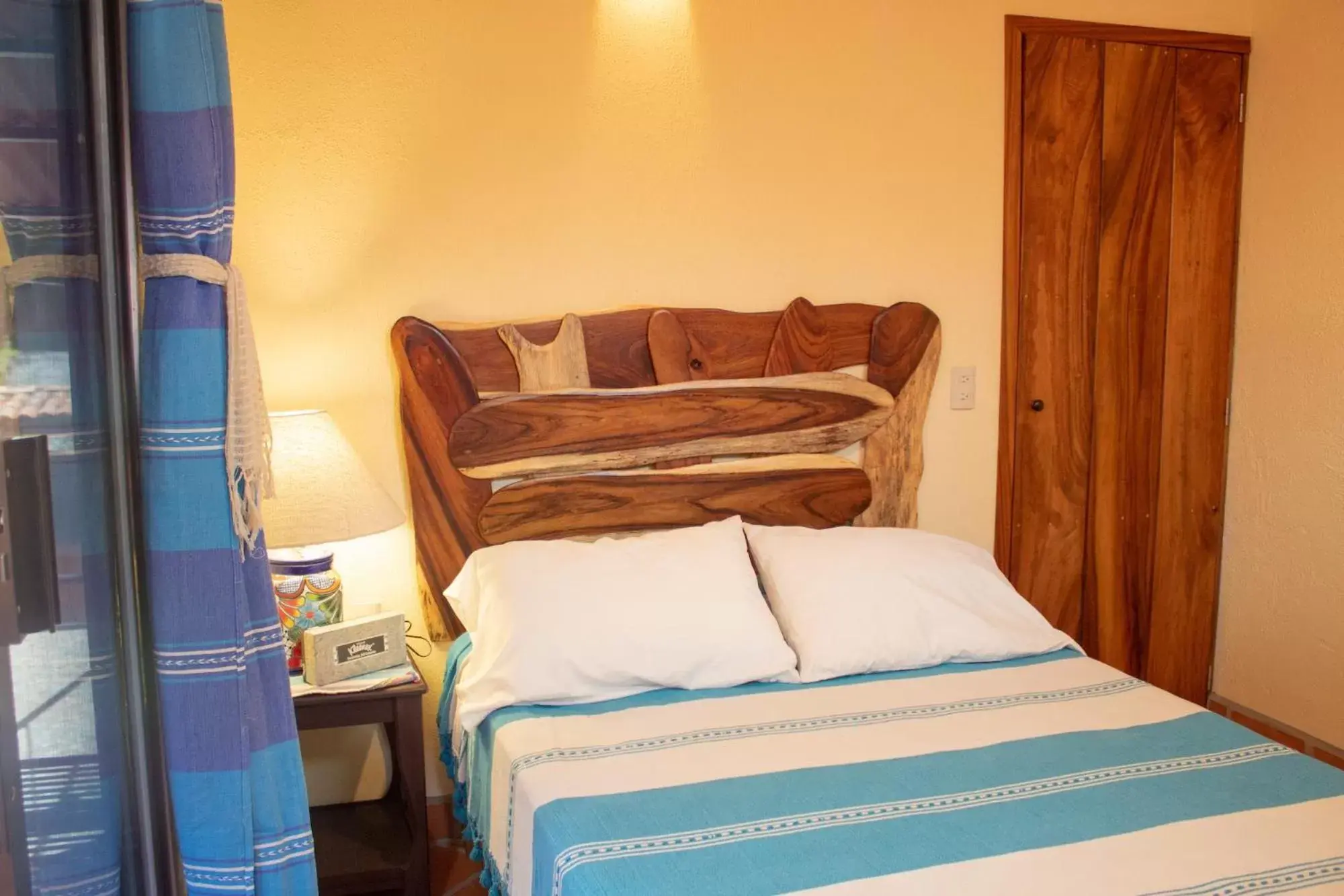 Bed in Hotel Casamar Suites