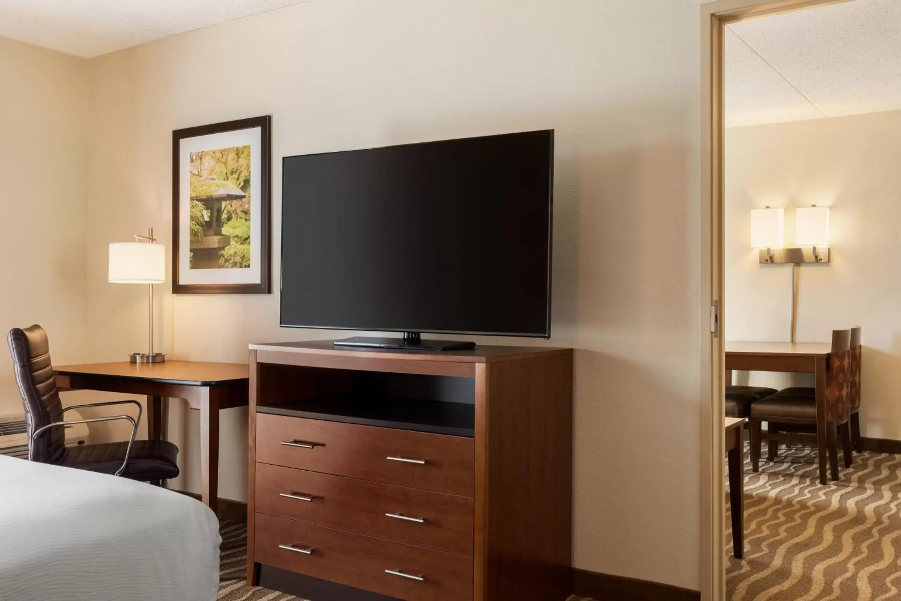 Photo of the whole room, TV/Entertainment Center in Holiday Inn Hotel & Suites Des Moines-Northwest, an IHG Hotel