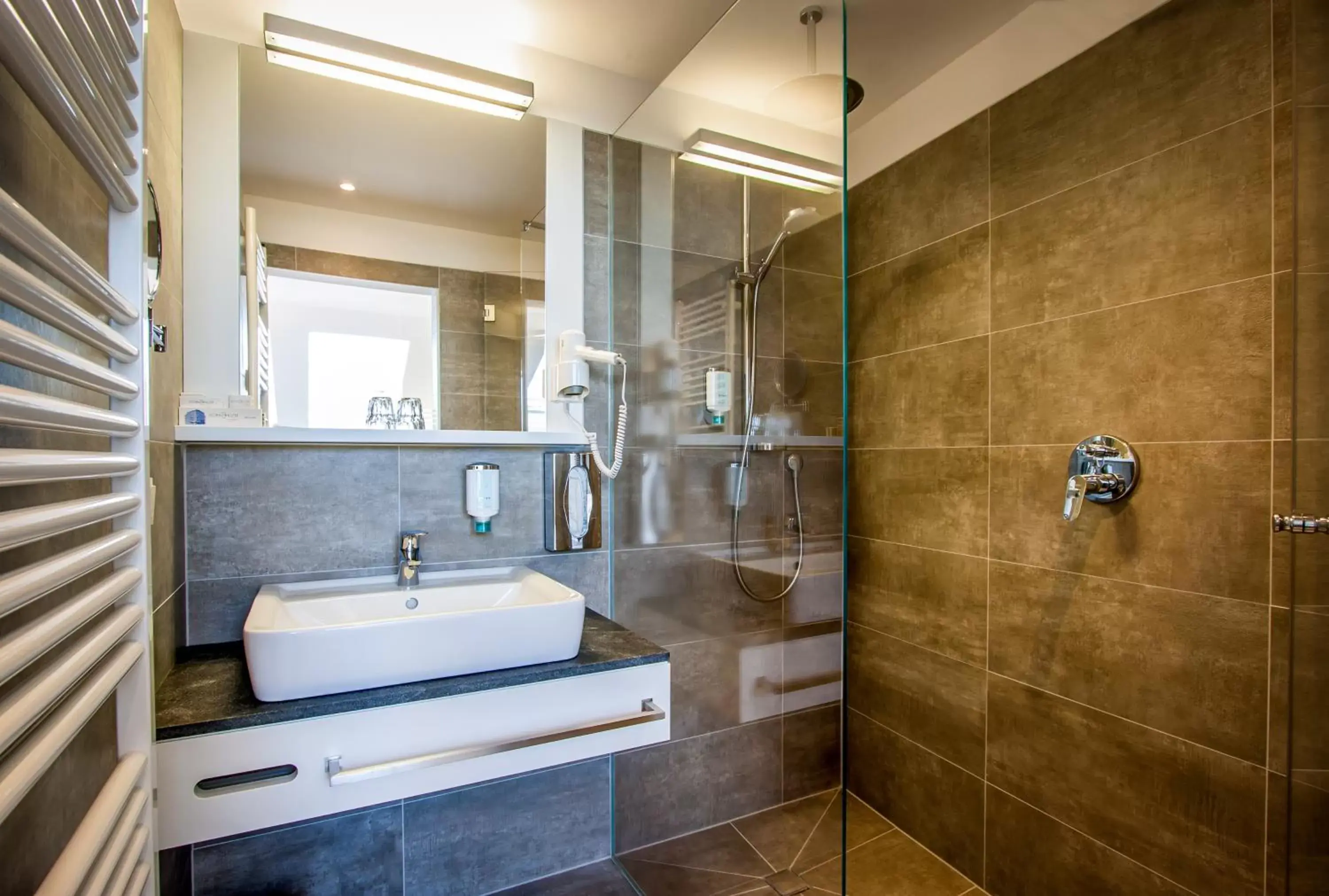 Bathroom in BoutiqueHOTEL Donauwalzer Bathroom in BoutiqueHOTEL Donauwalzer