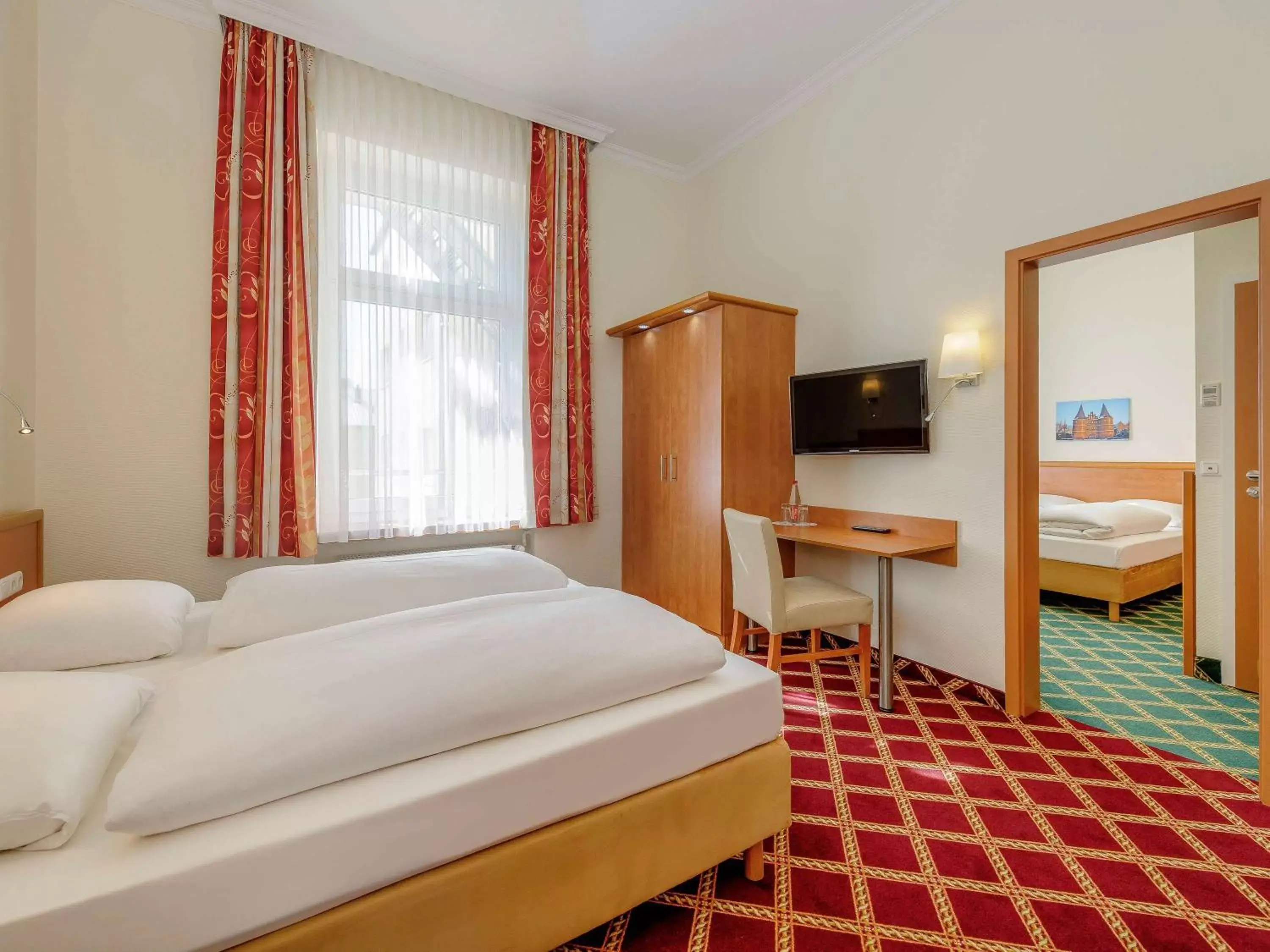 Photo of the whole room, Bed in Mercure Hotel Luebeck City Center