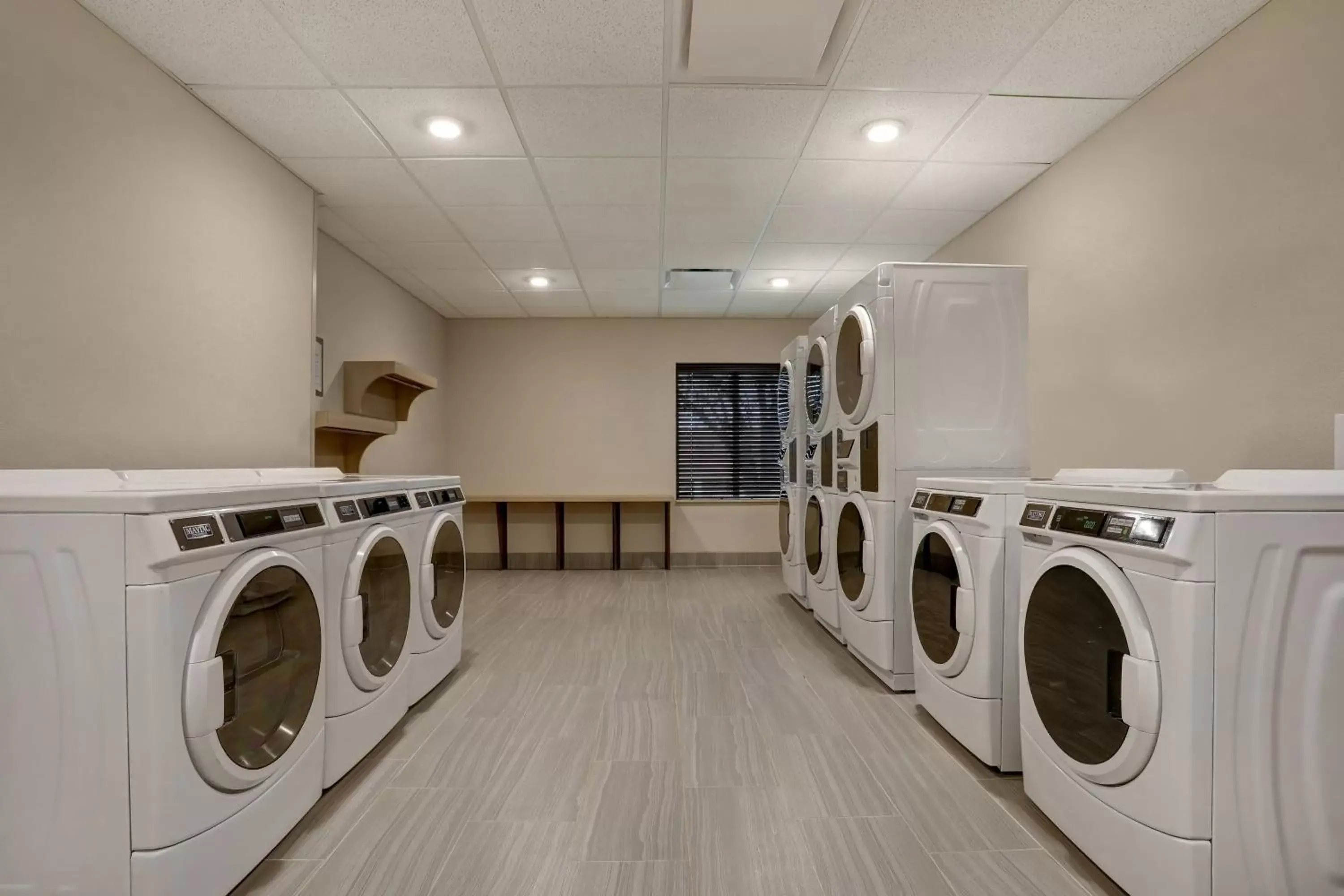 laundry, Kitchen/Kitchenette in Staybridge Suites - Overland Park - Kansas City S, an IHG Hotel